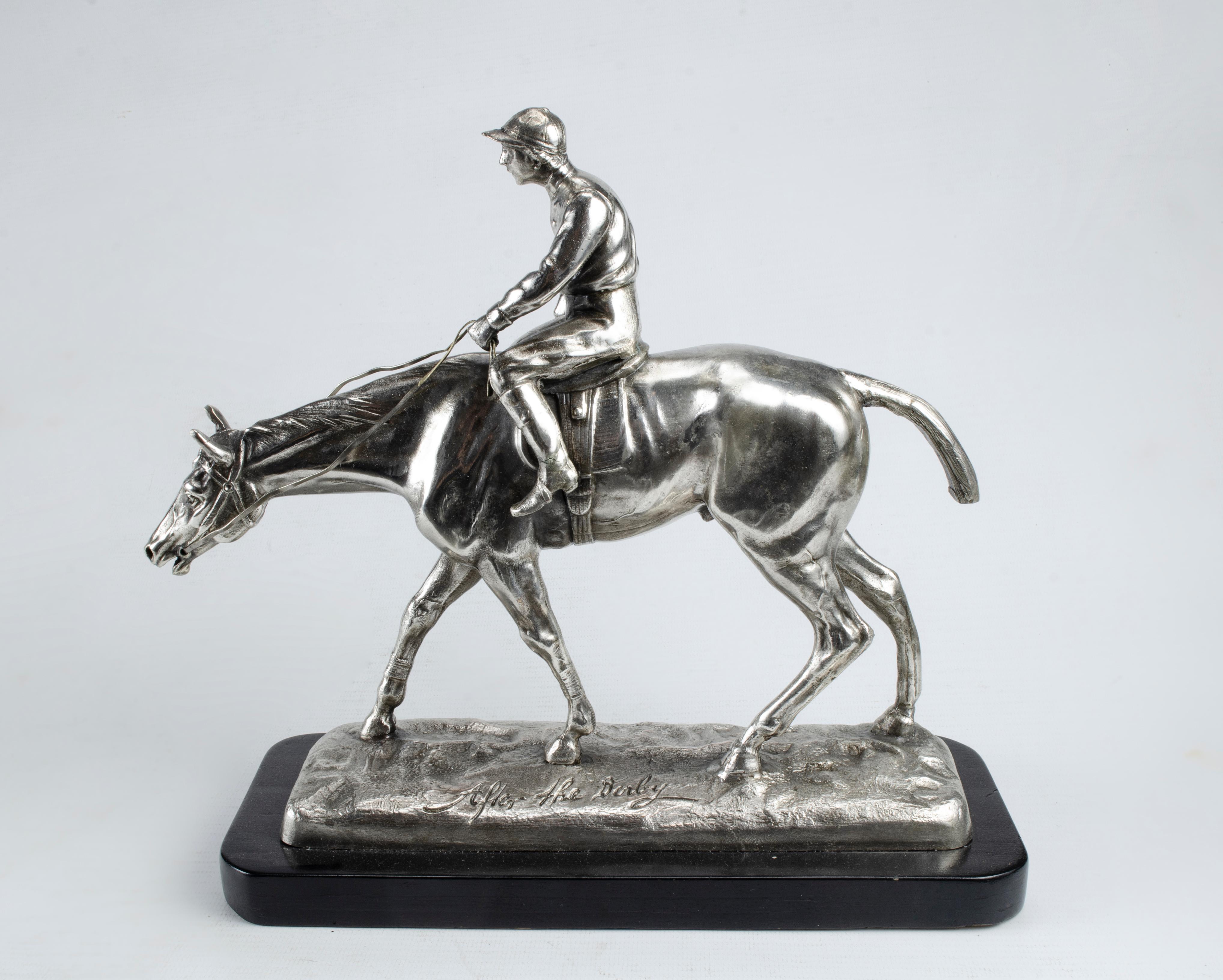 Sculpture after derby.
Material: Pewter with silver patina.
Origin Germany Circa 1900.
Good condition natural wear.
Racehorse and Jockey.
Patinated wooden base.
Art nouveau, modernist art or modernism was an international artistic and decorative