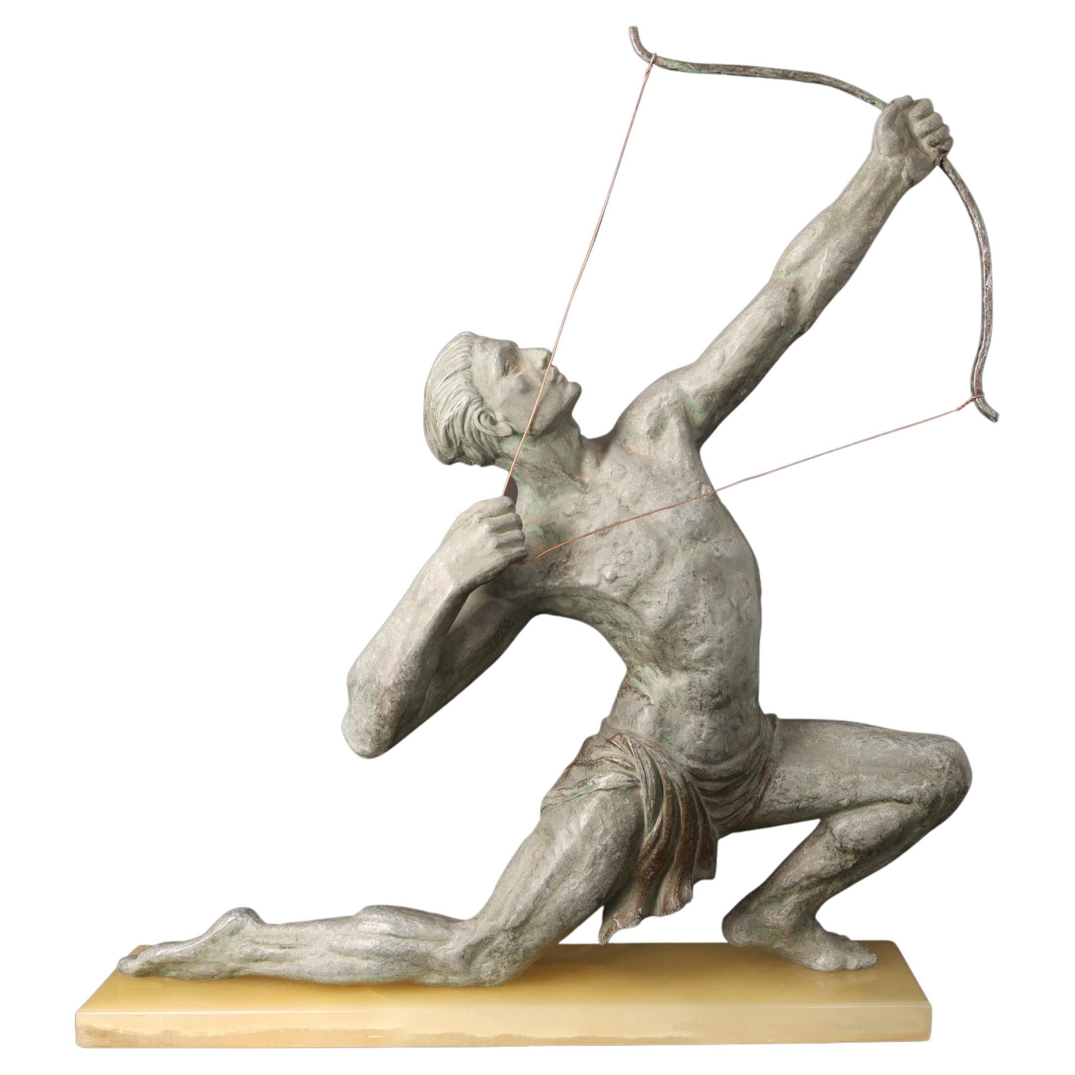 Scultura Art Deco in spelta "L'arciere" (1920 ca.) di Jean De Rancourt