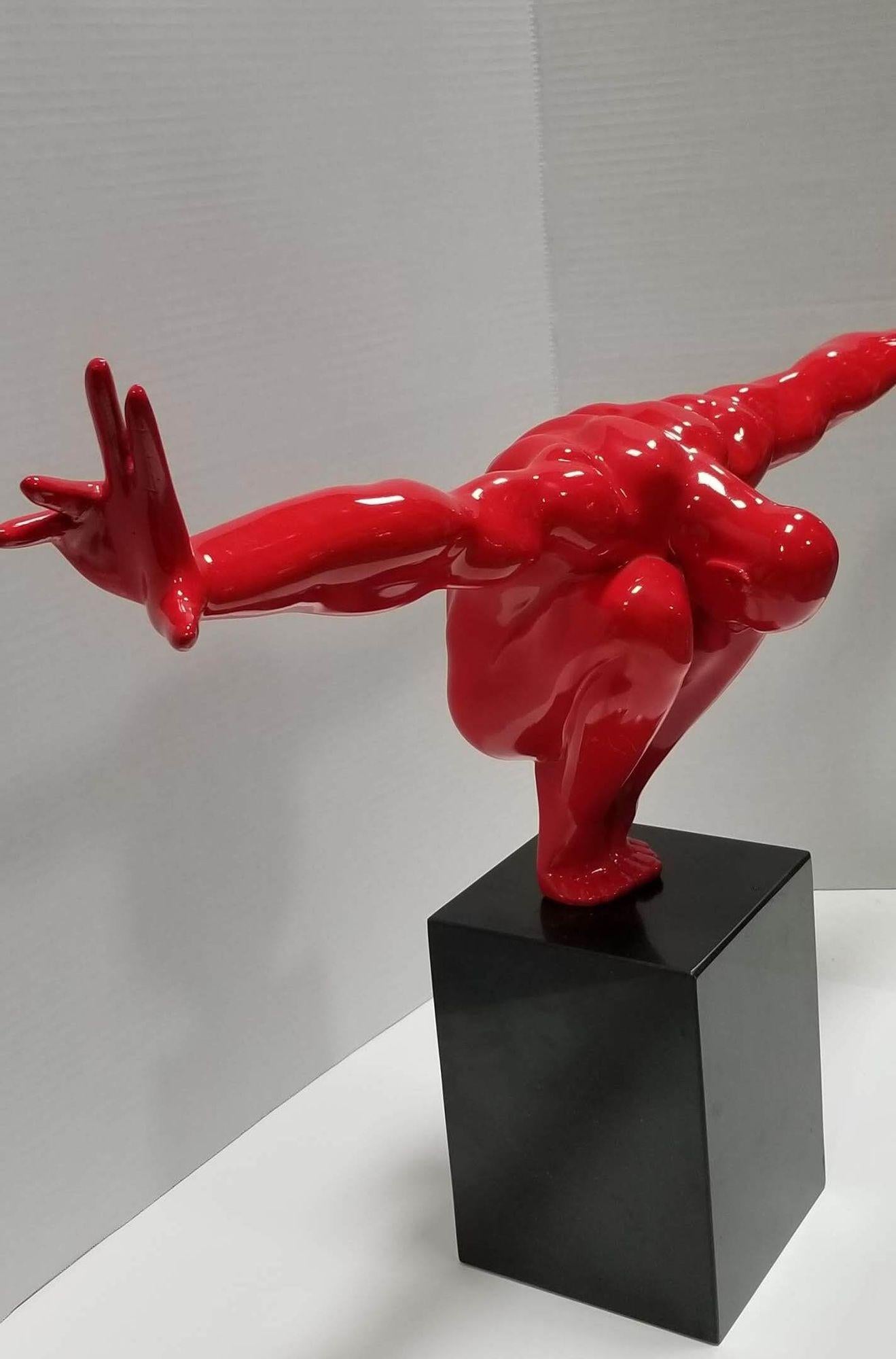 La sculpture de l'homme rouge est une pièce de décoration étonnante, qui ajoute une touche de sophistication à toute maison ou bureau. Cette sculpture masculine représente un homme accroupi aux bras tendus, symbolisant l'équilibre et l'expansion de