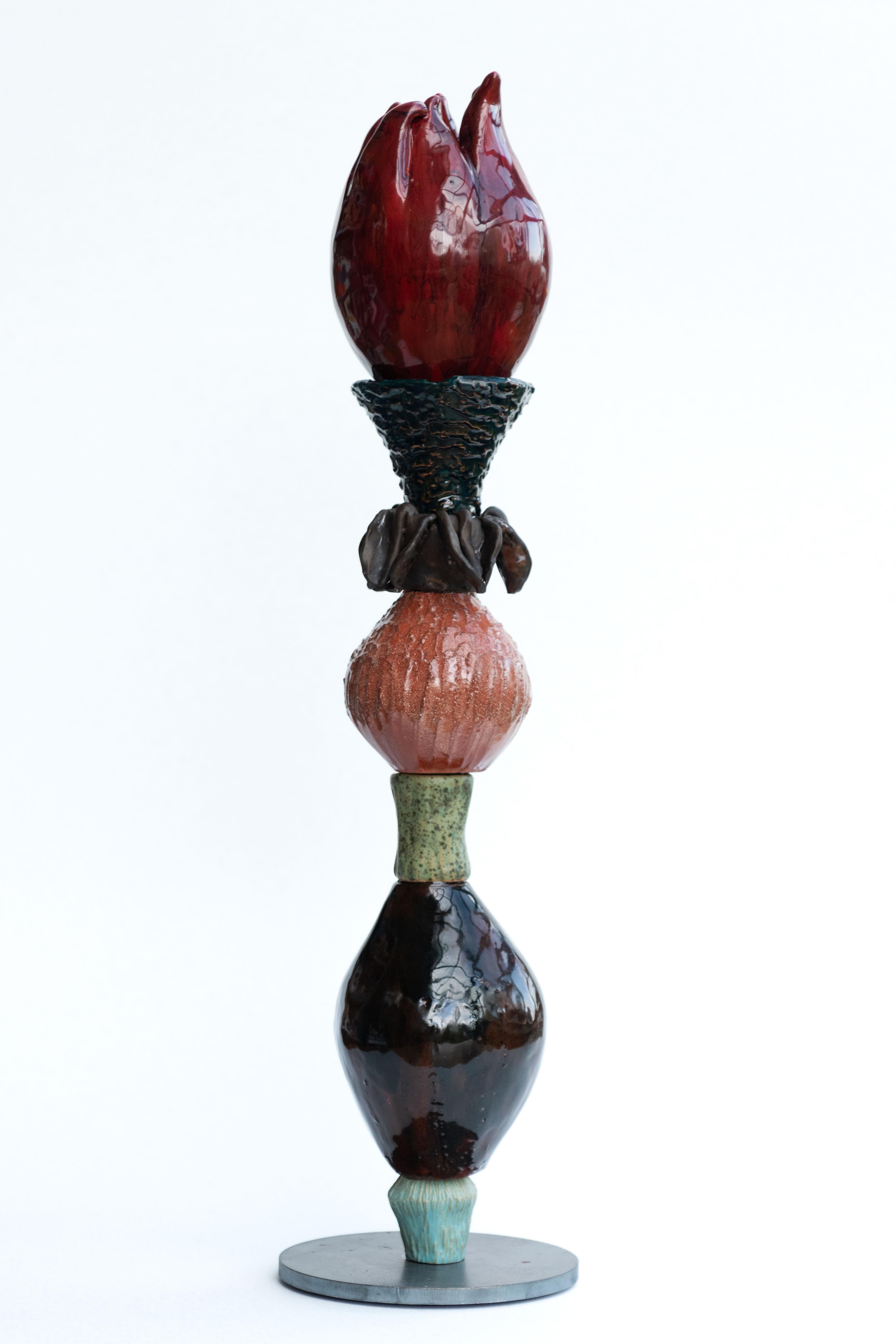 Scultura Bloomen 10 di Zanellazine Ceramics
Dimensioni: L 11 x H 60 cm
Materiali: Argilla rossa, argilla arancione semi-refrattaria.

Circa:
Giovanna Zighetti, ceramista e scenografa, e Lucia Zamberletti, consulente di moda, sono rispettivamente zia