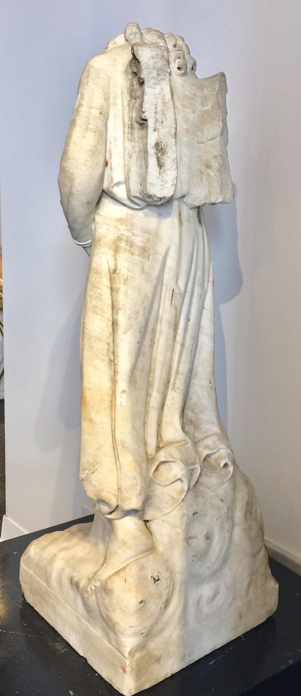 Italian Renaissance sculpture, rare and beautiful marble bust of an angel, 16th century, as found by archeologists in situ without the head and parts of the wings. The quality of the sculpture, the details the hands, feet, the draping of the fabric