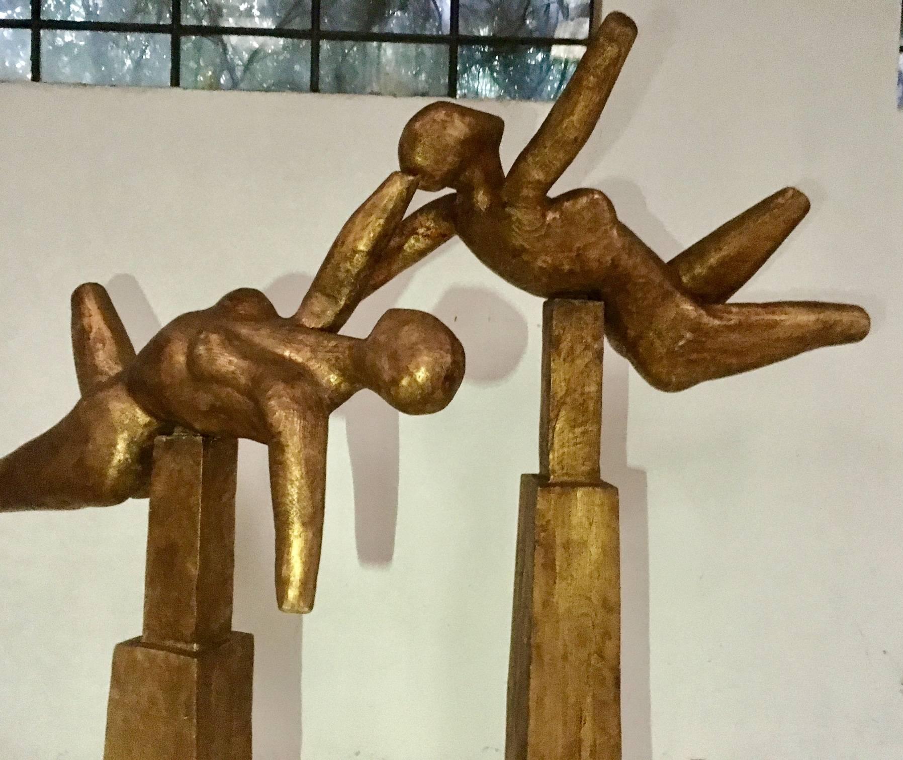 A massive sculpture by Californian artist Geoffrey Greene featuring two abstract figures representing two goddesses.
Title: Goddesses of the Air.
Wood and gold leaf
Size 150 cm large by 50 cm deep x by 205 cm High
145 cm large by 70 cm deep x by