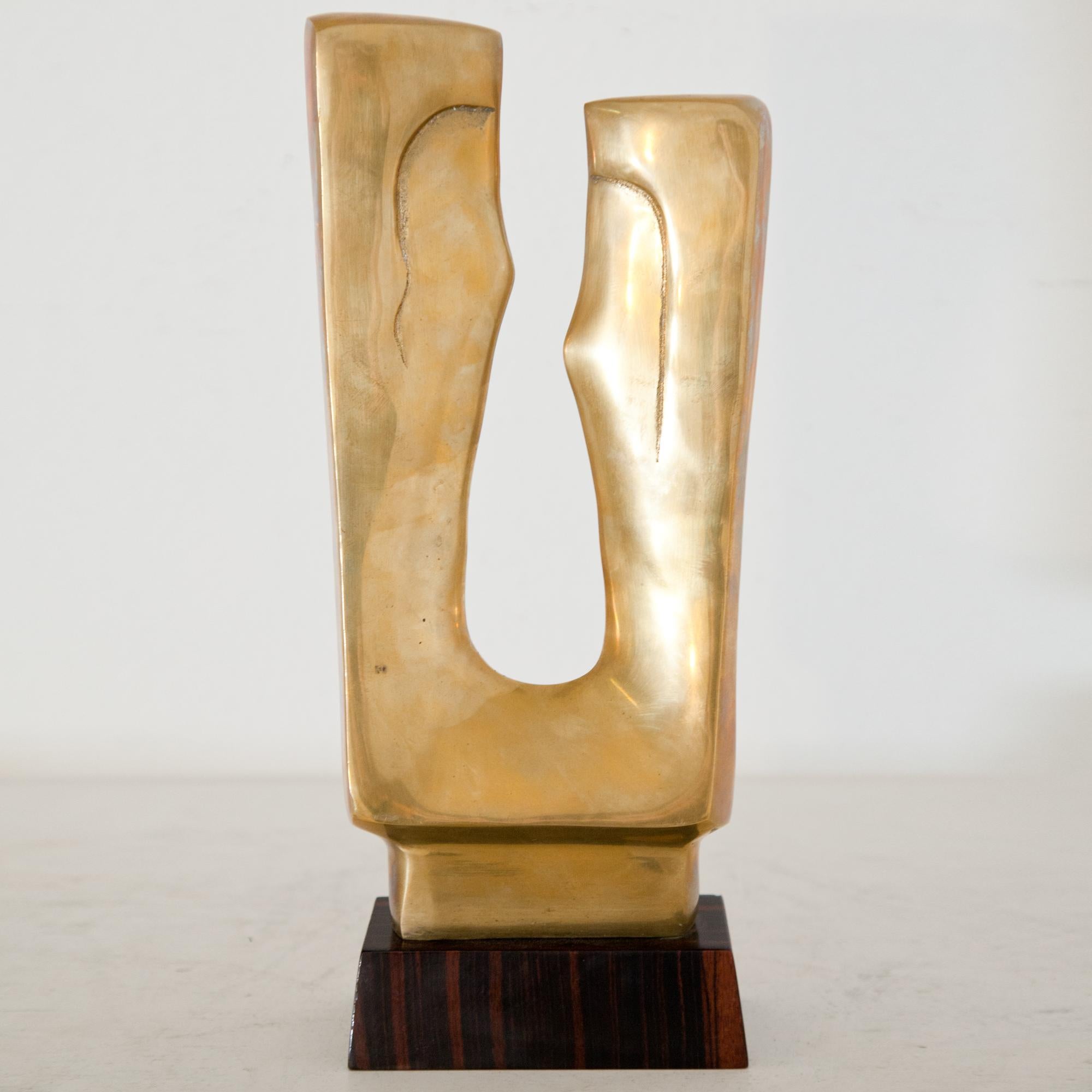 Abstract bronze sculpture by Gérard Koch (1926-2014) on a trapezoidal veneered base. Signed G. Koch and dated 1987. (Plinth 4.5 x 15x 7.5).