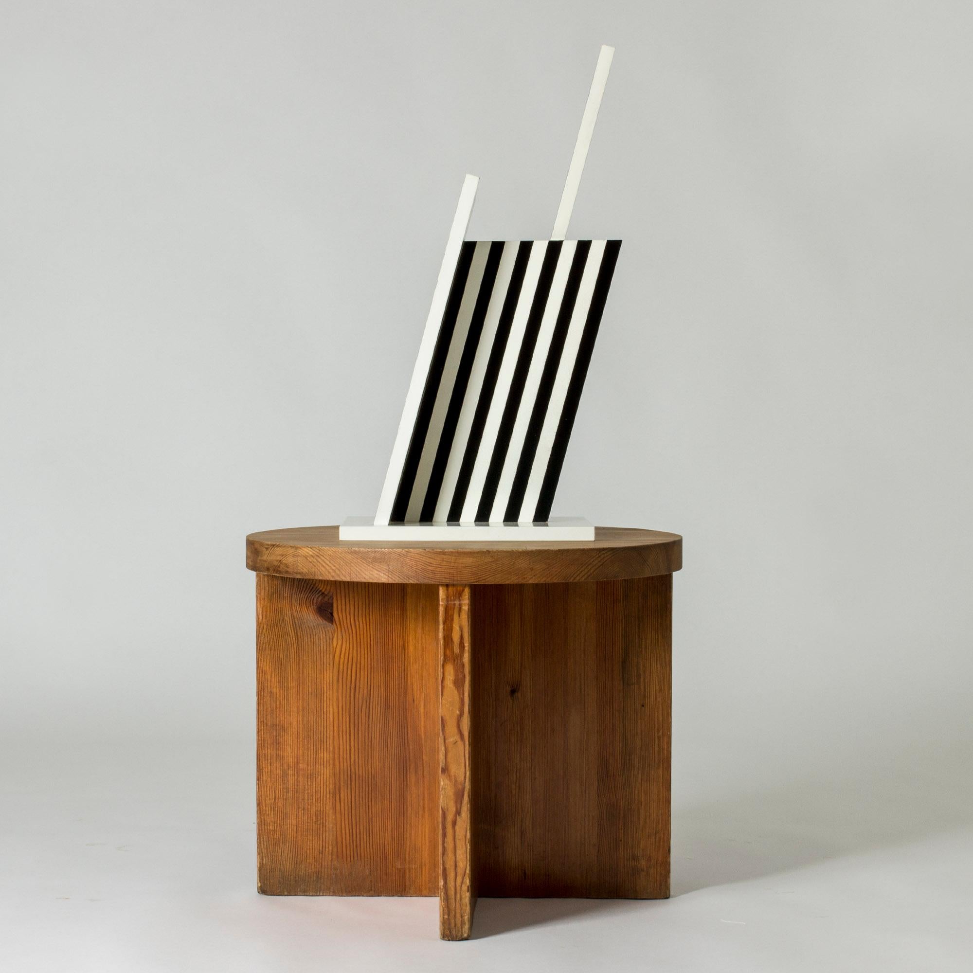 Striking sculpture by Lars Erik Falk, made from composite wood and tilted at Falk’s signature 73 degrees. Painted in a distinct pattern of black and white stripes.

Lars Erik Falk (1922-1918) was one of Sweden’s foremost constructivists. He was a
