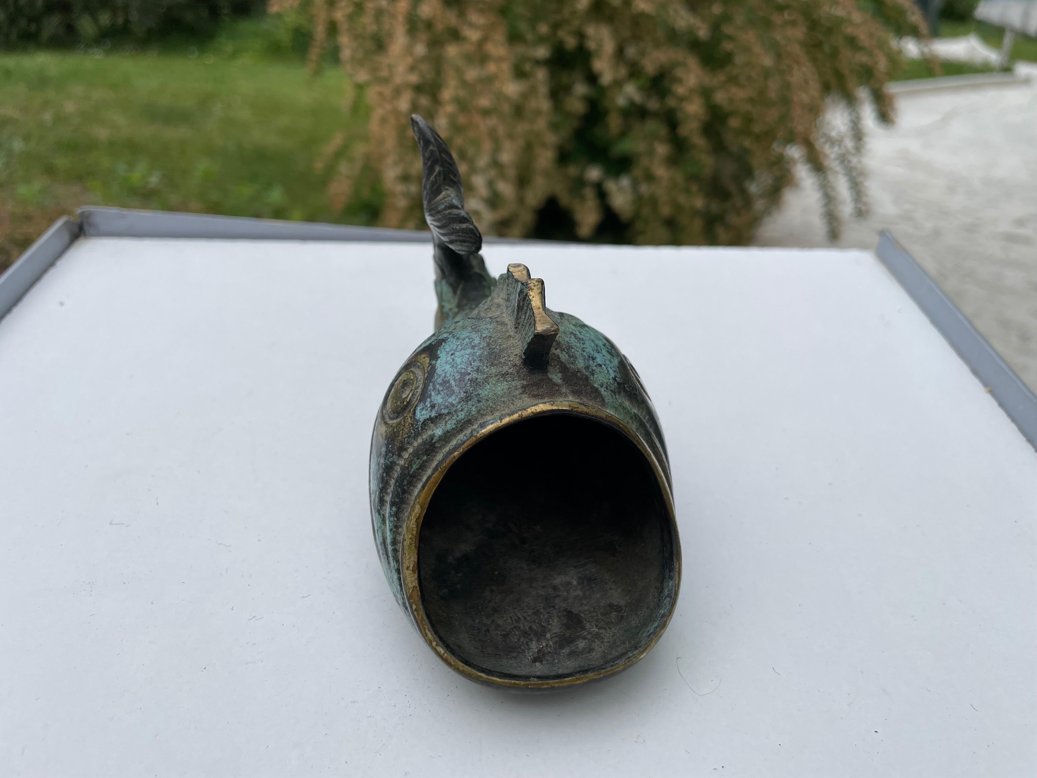 This ashtray is a sculpture from walter bosse, it is in Bronze with a green and gold patina. it has been done circa 1950 in Wien.