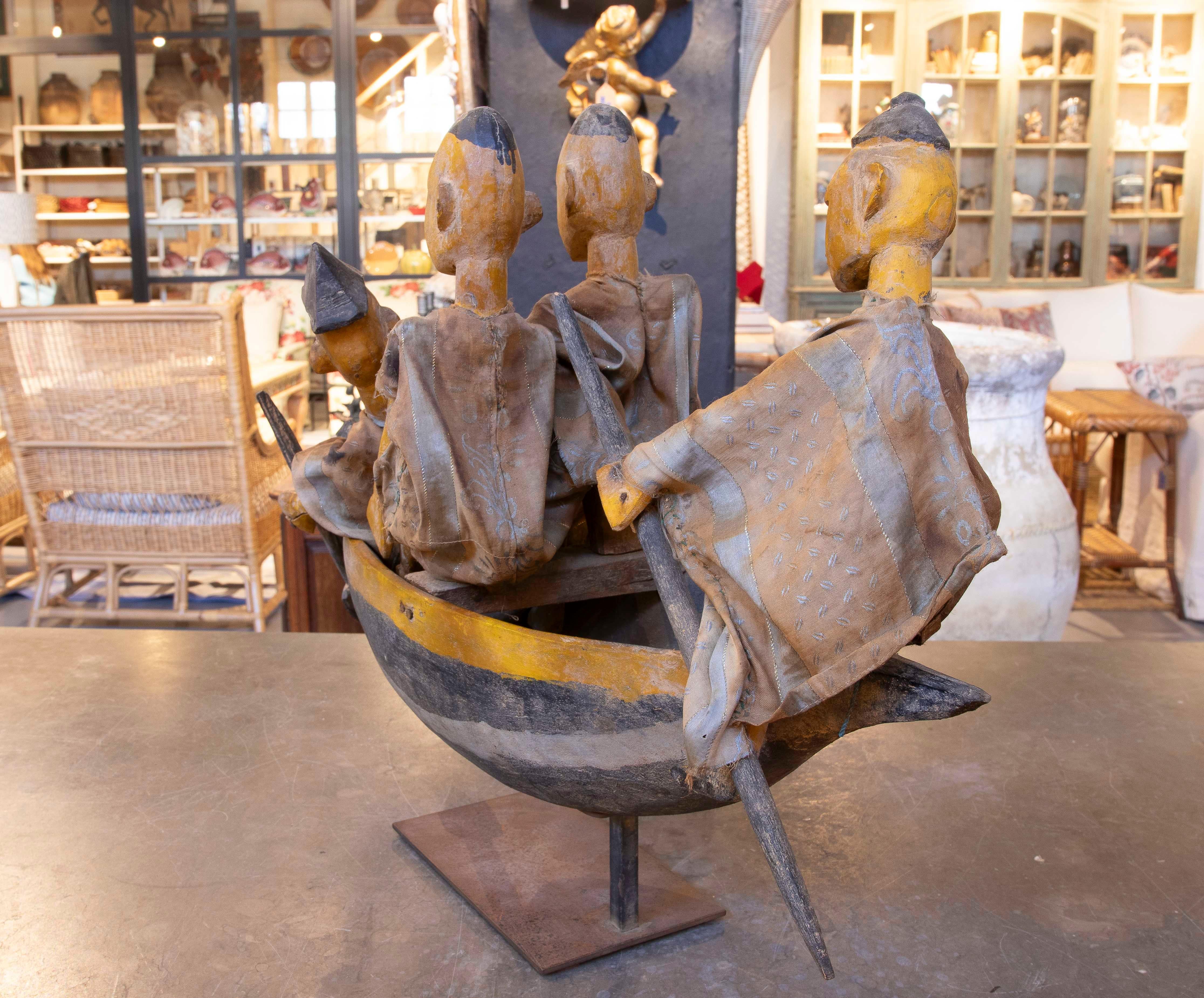 Fabric Sculpture Carved in Wood of Characters in a Boat with Cloth Costumes For Sale