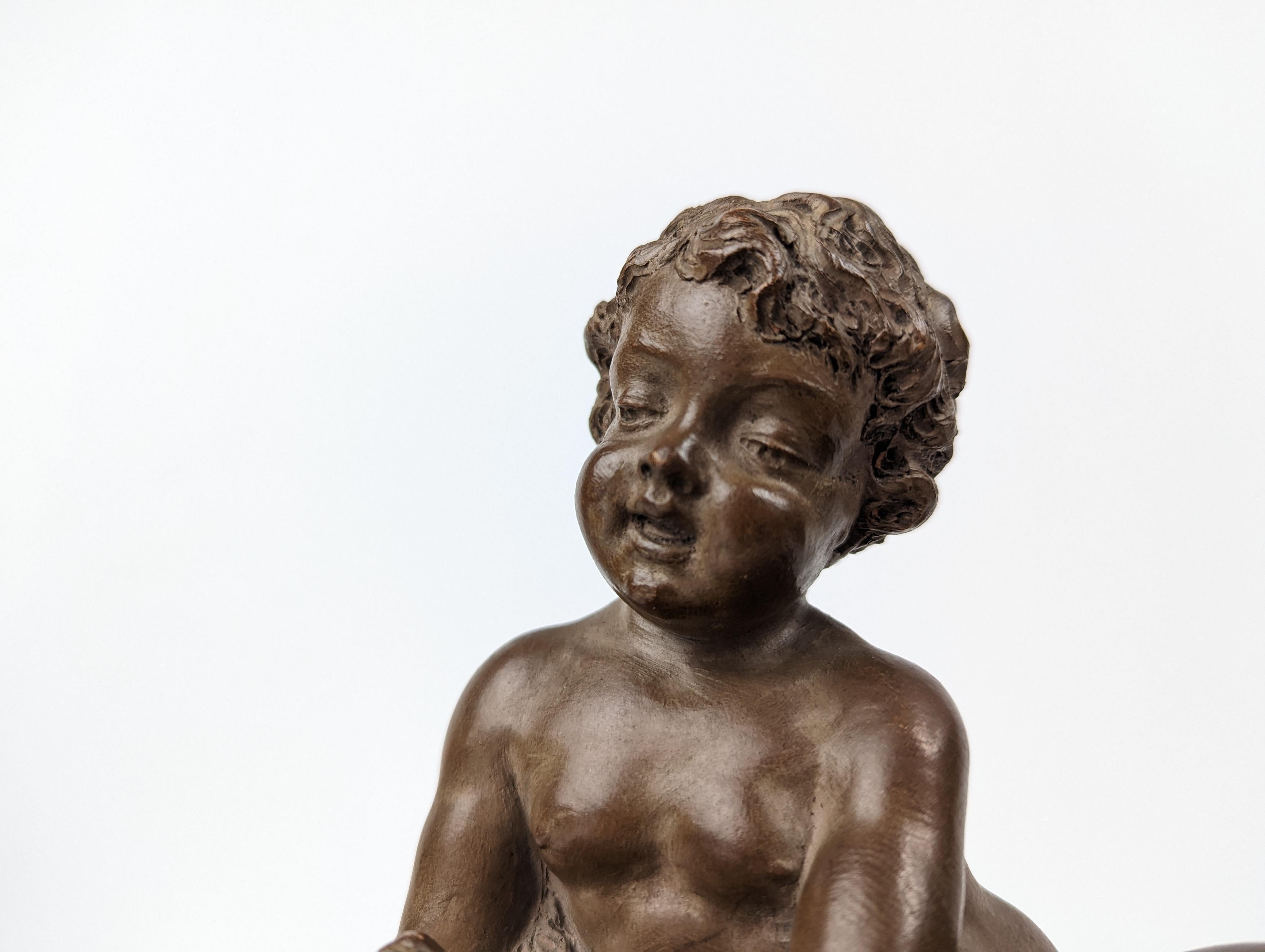 Sculpture Child Hercules on Lion Skin by Renè Rod in Terracotta For Sale 11