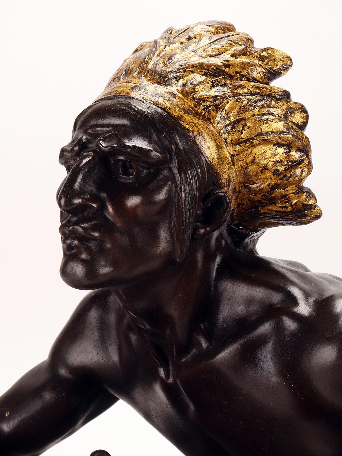 Metal Sculpture clock depicting a native American, France 1890. For Sale