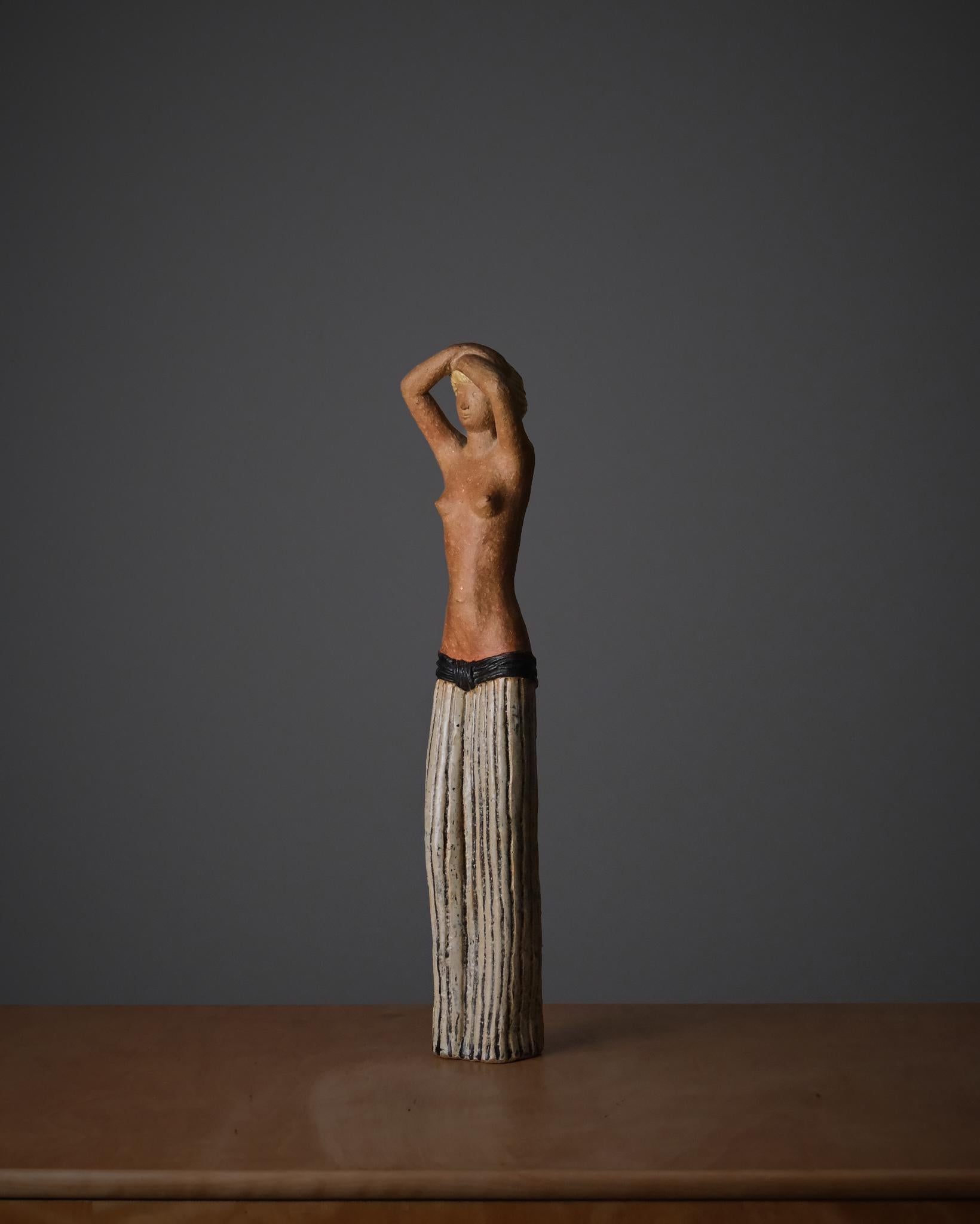 Chamotte stoneware, partially glazed. Signed “Stig L” with the Gustavsberg Studio hand mark on the underside.

A characteristic early studio work by Lindberg, featuring the textured chamotte body and subtle glazing typical of his 1940s production.