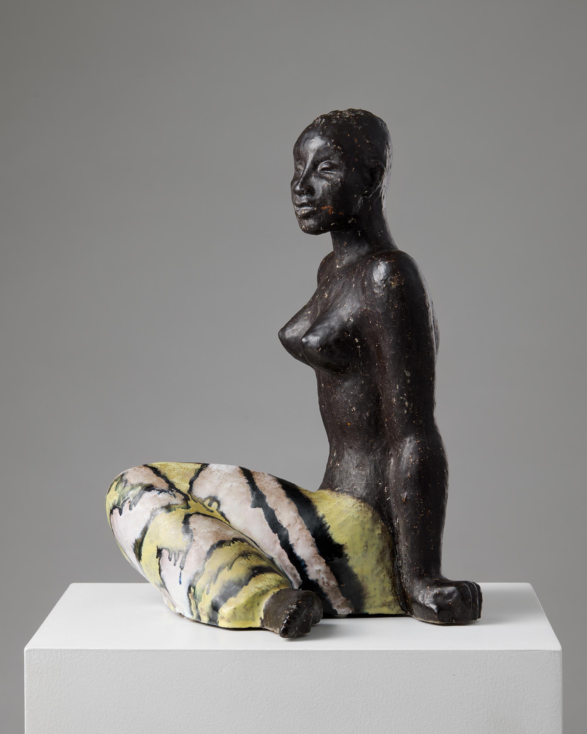 Woman sculpture designed by Vicke Lindstrand for Uppsala Ekeby
Sweden, 1947-1948.

Stoneware.

H: 39 cm / 15 1/4''
W: 30.5 cm / 12''