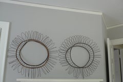 Sculpture for wall; midcentury industrial bead wire tire form, priced as a pair