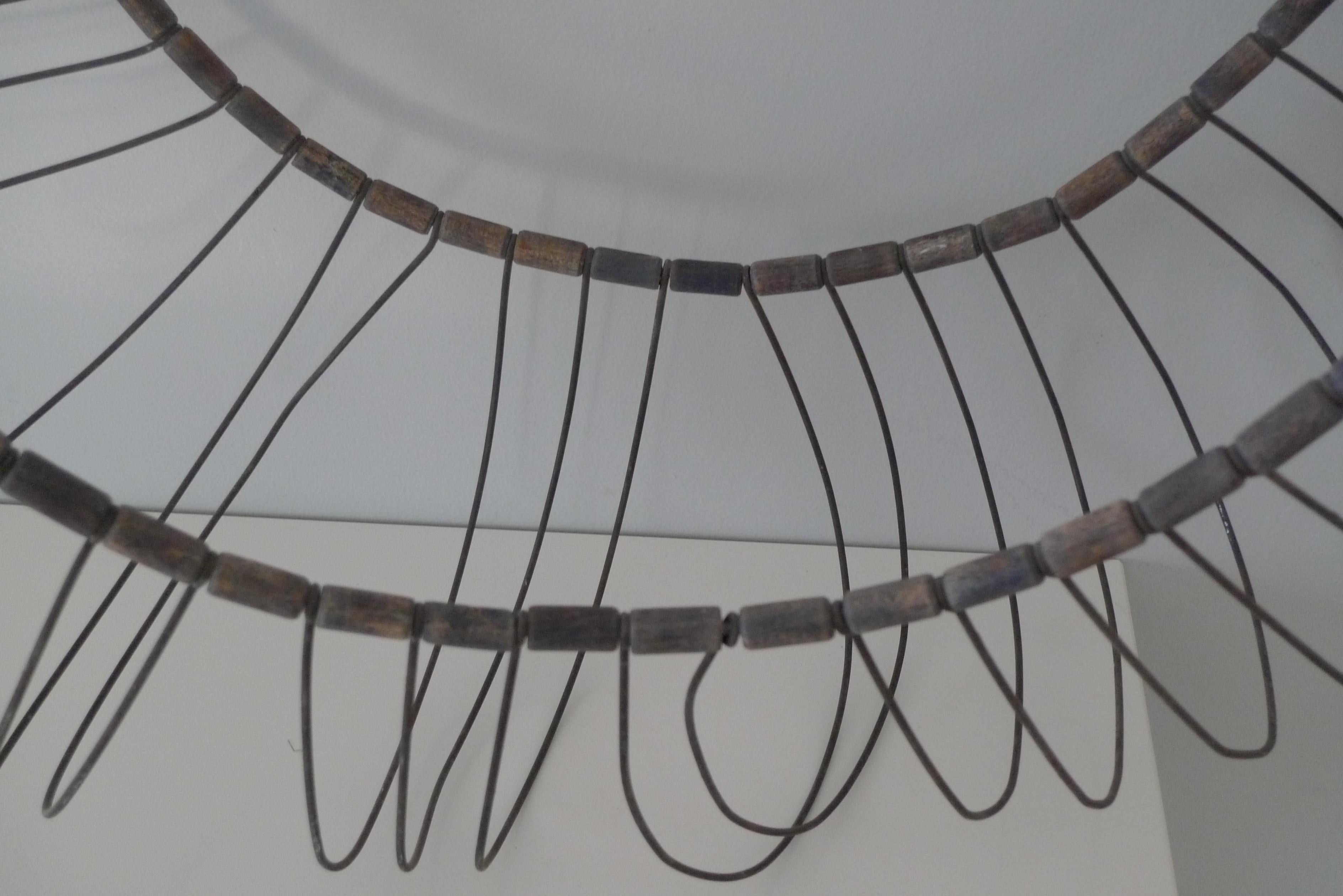 American Sculpture for wall; midcentury bead wire tire structure, pair; like an eel trap For Sale