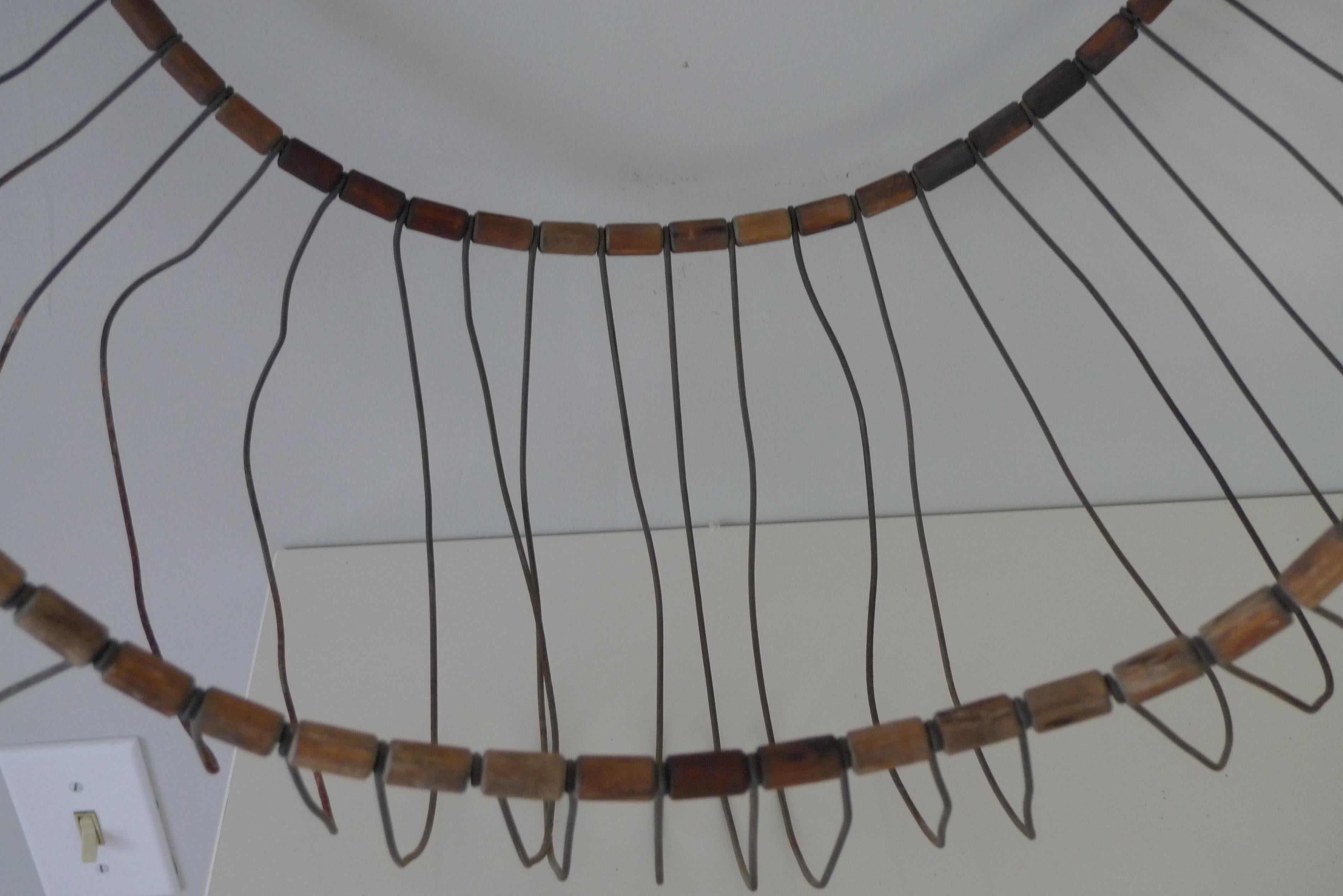 20th Century Sculpture for wall; midcentury bead wire tire structure, pair; like an eel trap For Sale