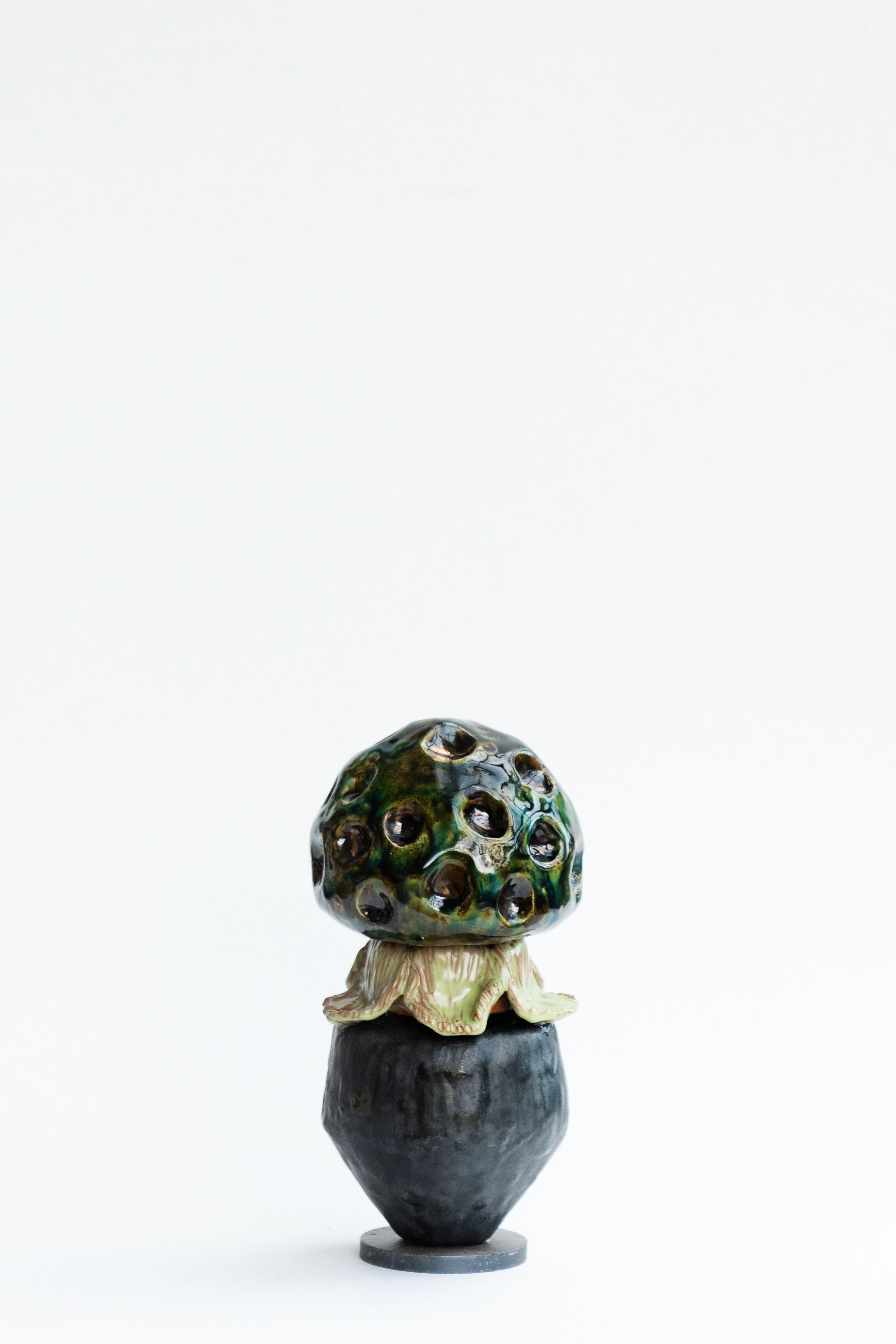 Escultura FUNGHI 17 de Zanellazine Cerámica
Dimensiones: An 12 x Al 23,5 cm
Materiales: Arcilla roja y blanca. 

Sobre:
Giovanna Zighetti, ceramista y escenógrafa, y Lucia Zamberletti, asesora de moda, son tía y sobrina respectivamente. En su