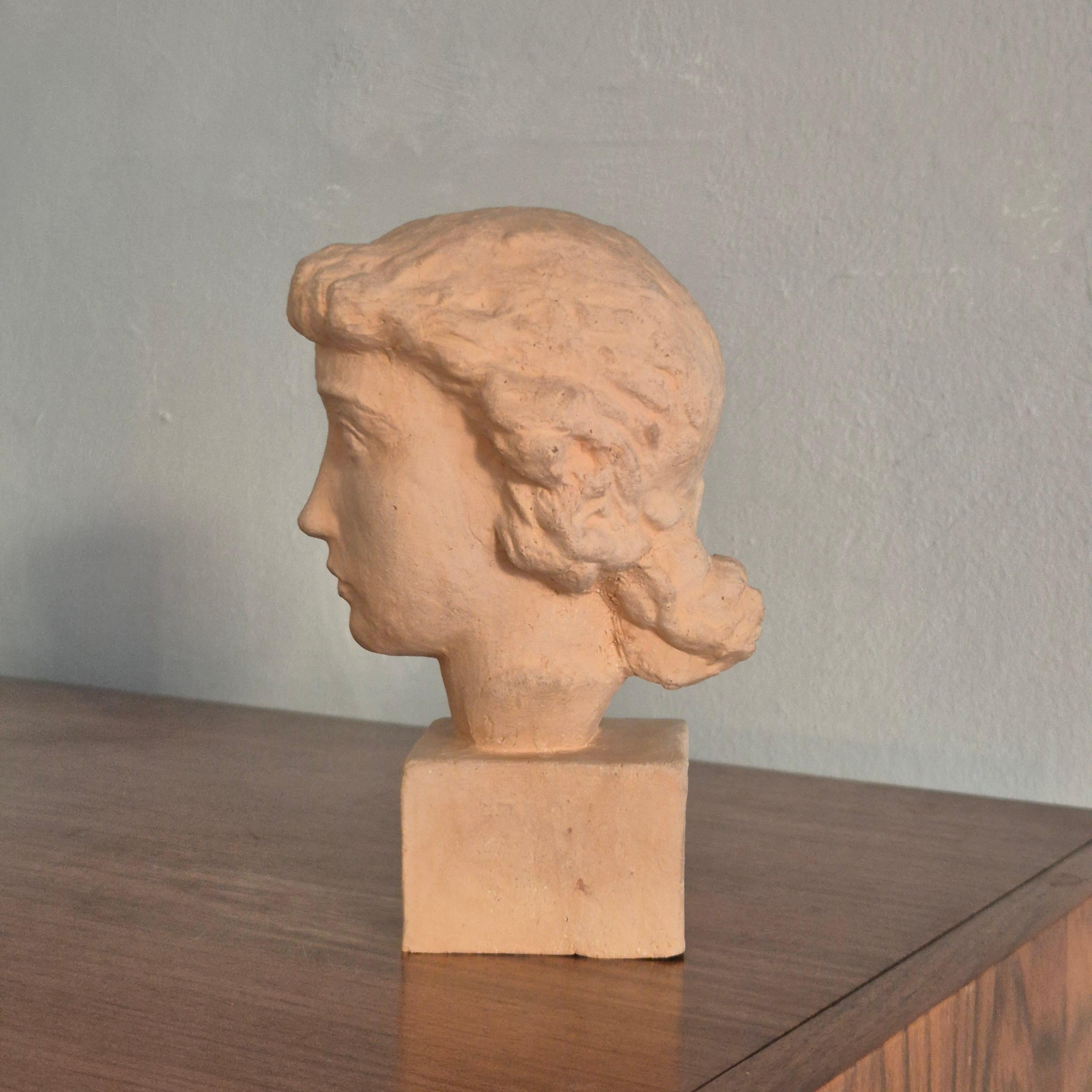 Swedish Sculpture, head of a woman in light terracotta, Alex Waleij, Sweden early 1900s. For Sale