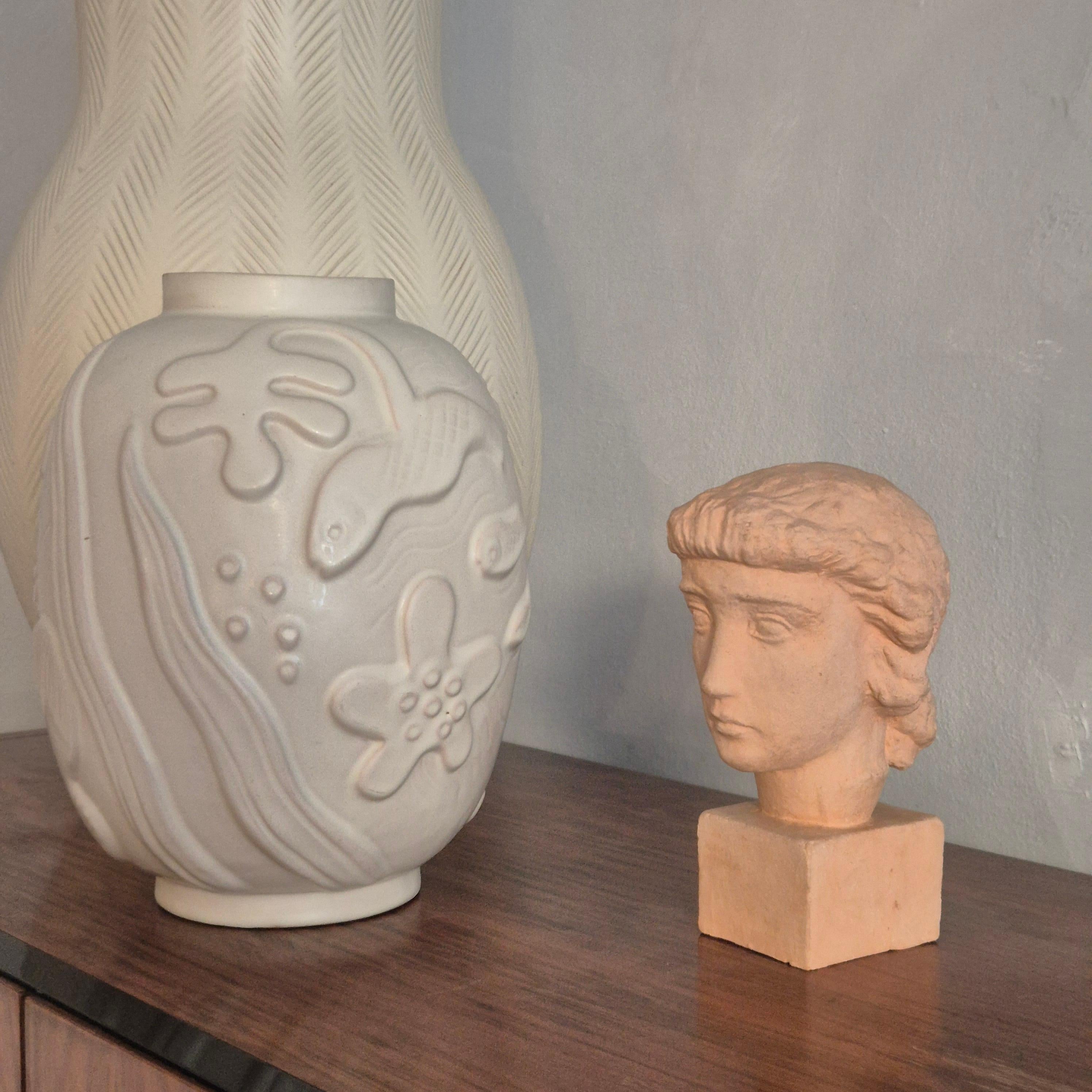 Sculpture, head of a woman in light terracotta, Alex Waleij, Sweden early 1900s. In Fair Condition For Sale In Stockholm, SE