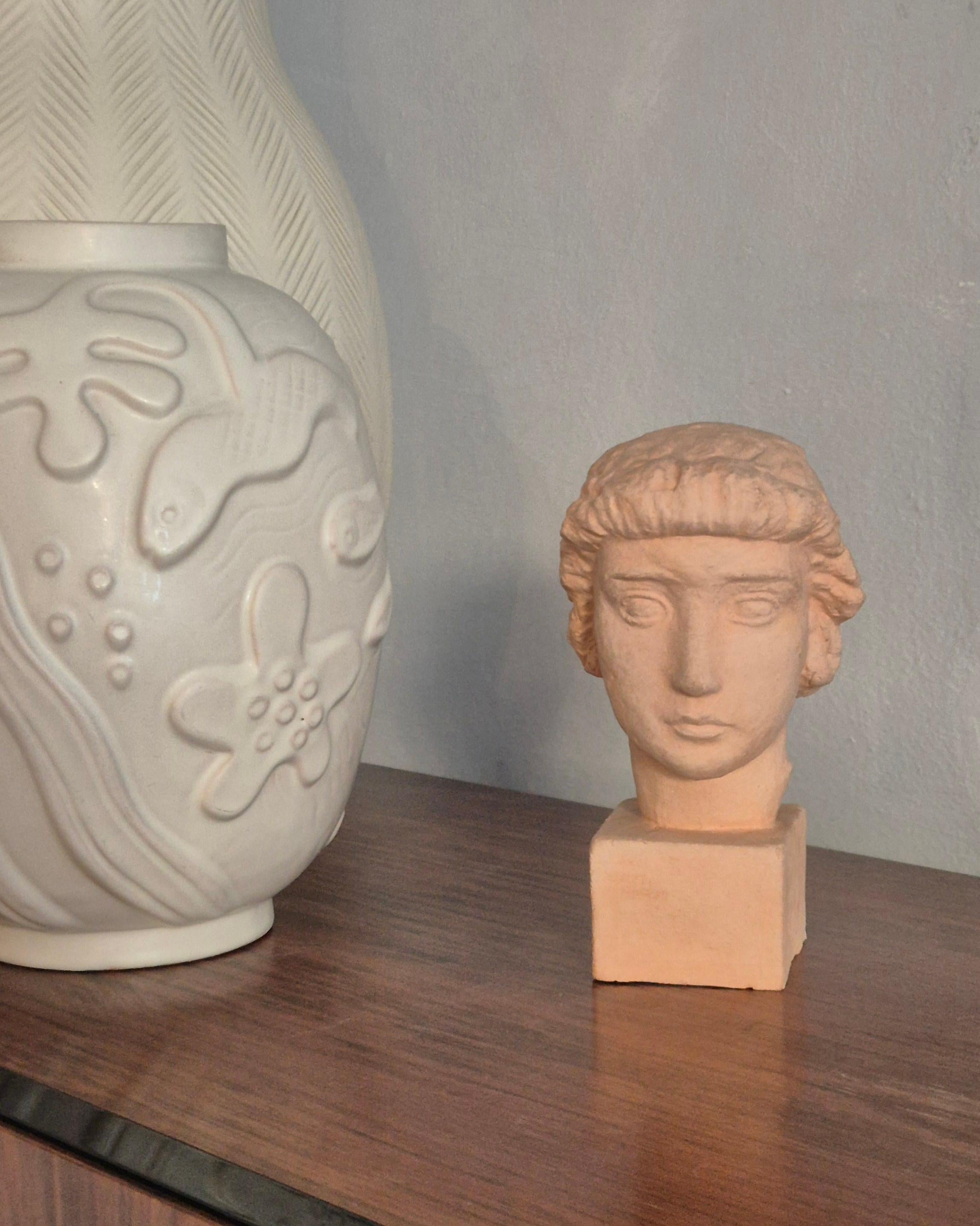 Terracotta Sculpture, head of a woman in light terracotta, Alex Waleij, Sweden early 1900s. For Sale