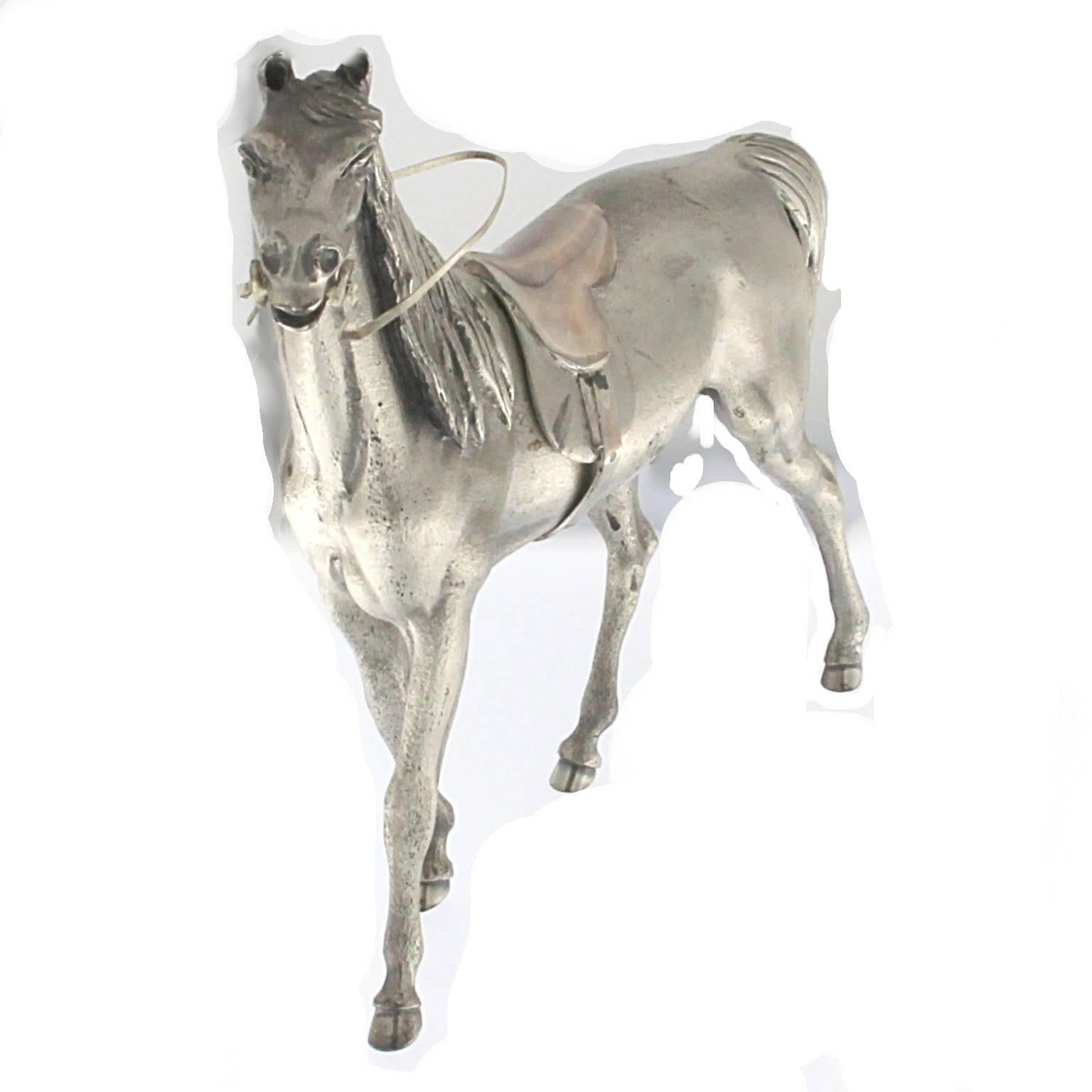 Sculpture Horse saddled in silver
