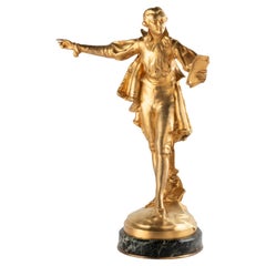 Escultura en bronce dorado y base de mármol de Paul Ducuing, siglo XIX.