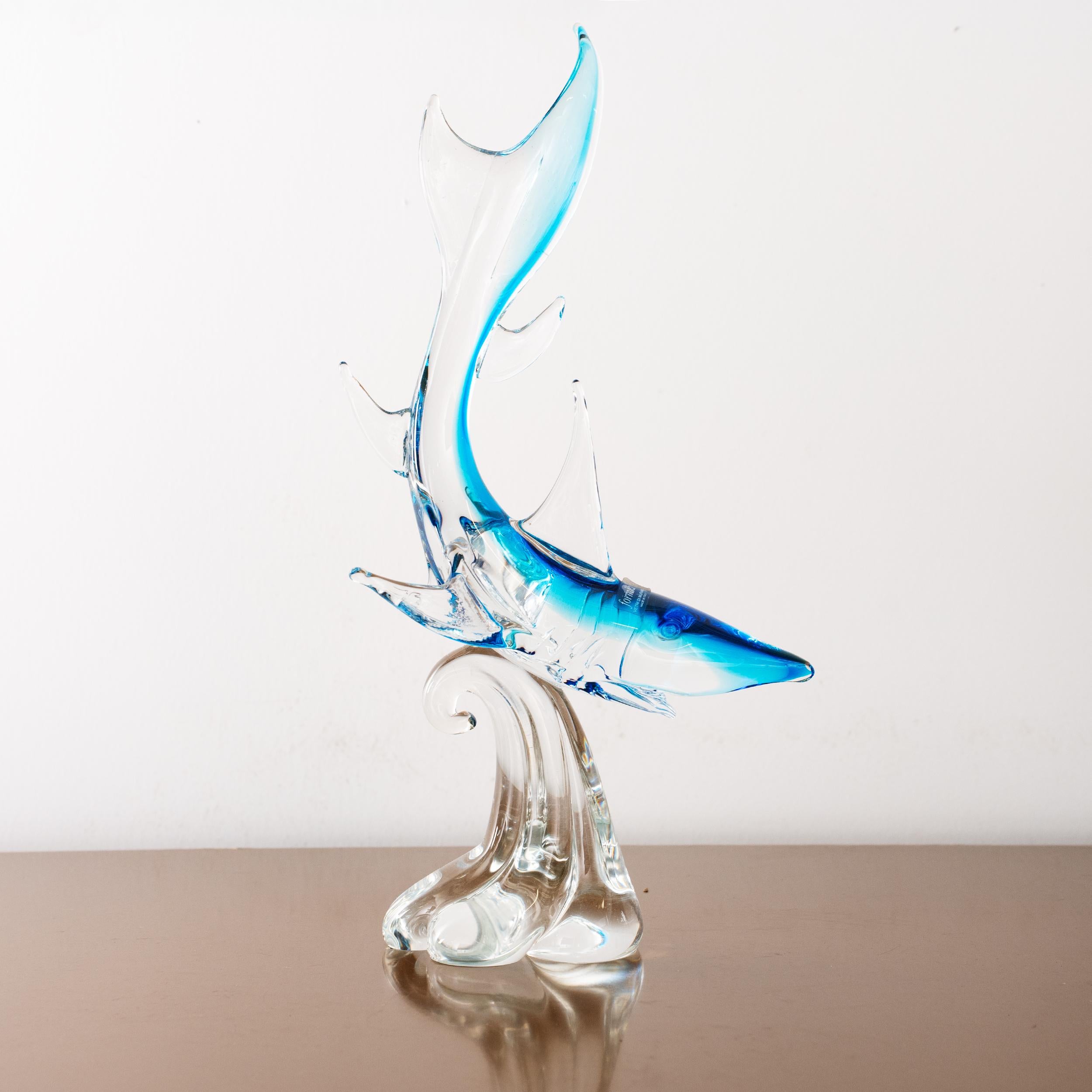 Sculpture in Murano glass, blue Shark with crystal details, Italy in stock

Dimensions: L 23 cm x H 42 cm x D 23 cm ( L 9.0