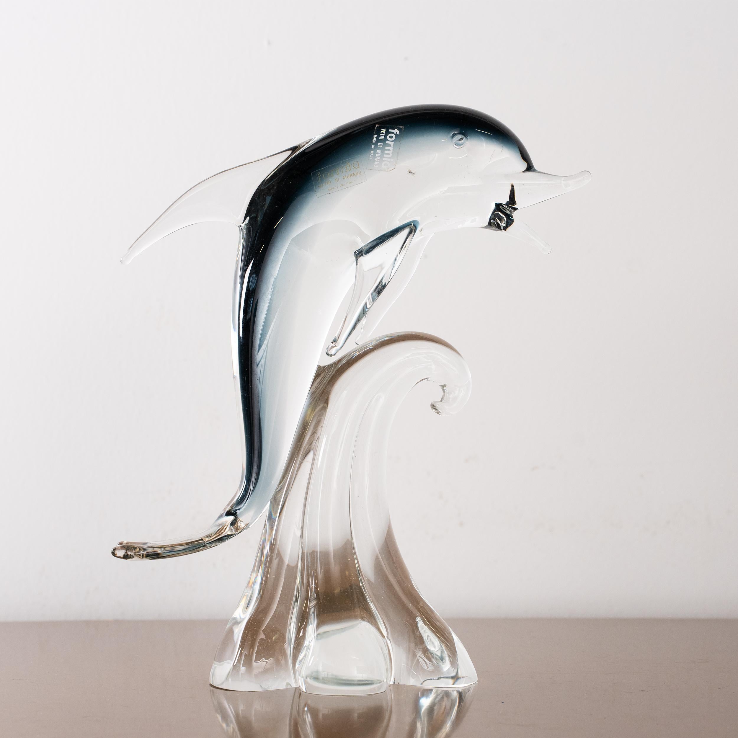Sculpture in Murano glass, grey Dolphin with crystal details, Italy in stock

Dimensions: L 22 cm x H 28 cm x D 22 cm ( L 8.6