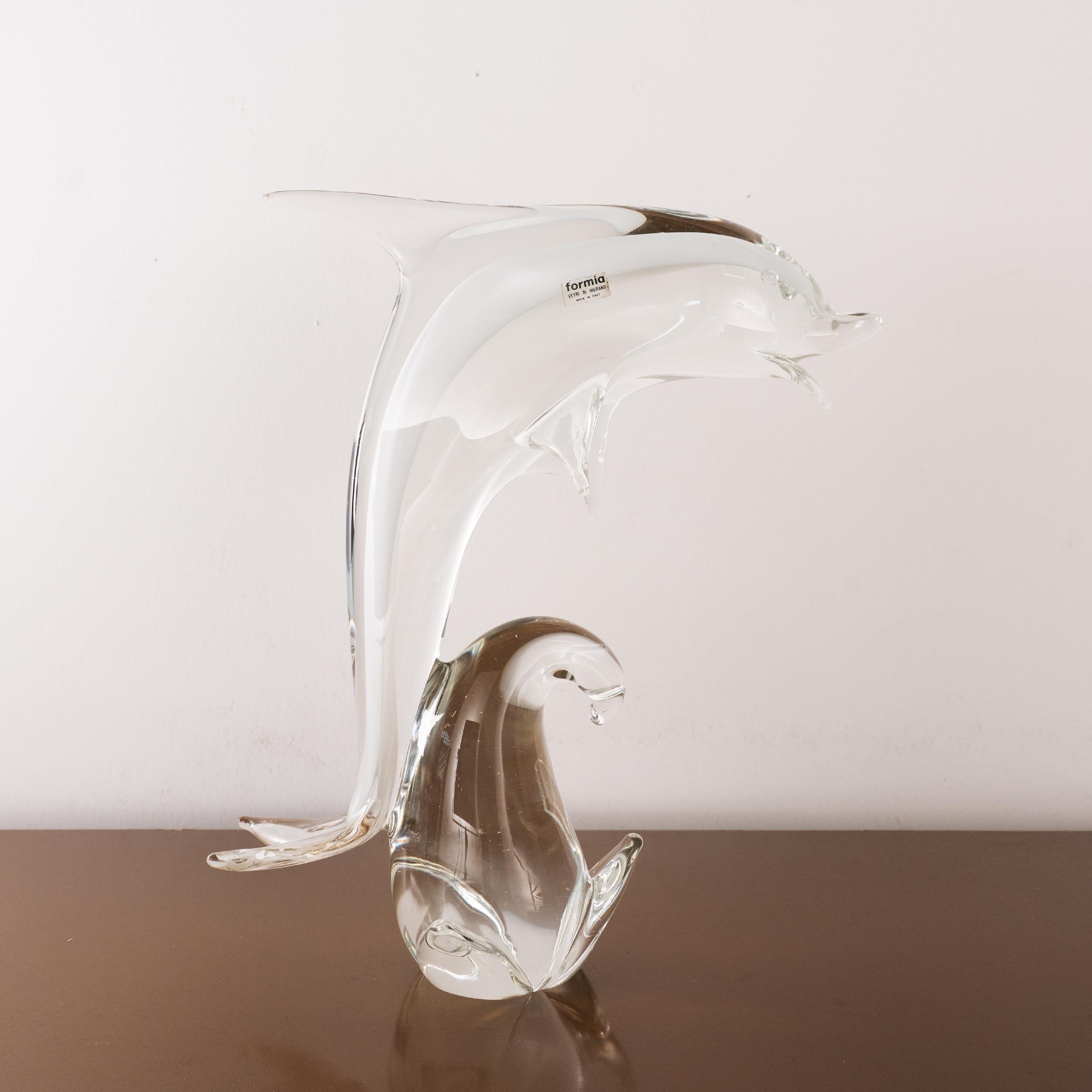 Sculpture in Murano glass, white Dolphin with crystal details, Italy in stock

Dimensions: L 34 cm x H 44 cm x D 34 cm ( L 13.3