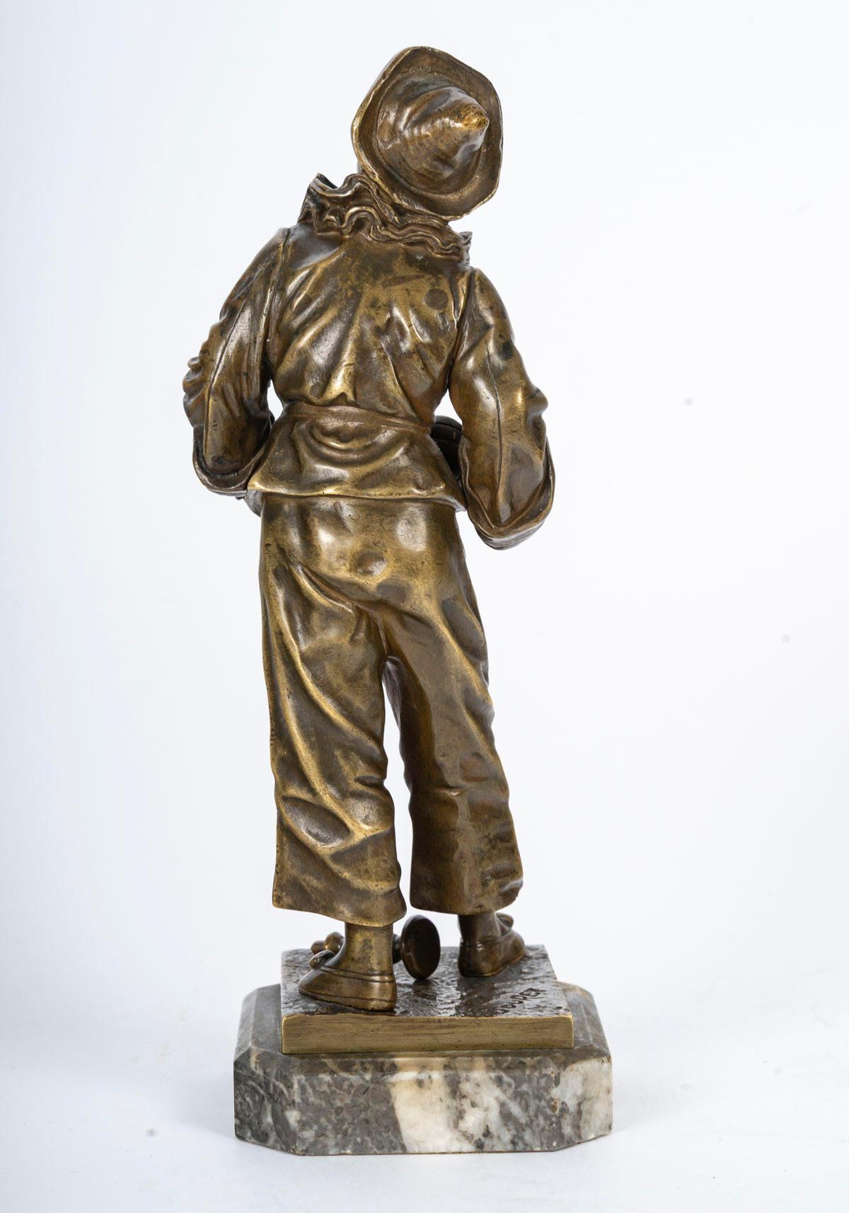 Patinato Scultura in bronzo patinato, firmata Bouret, XX secolo, stile Art Déco. in vendita