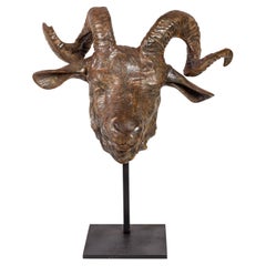 Sculpture in Patinated Cast Iron of a Ram on a Pedestal.