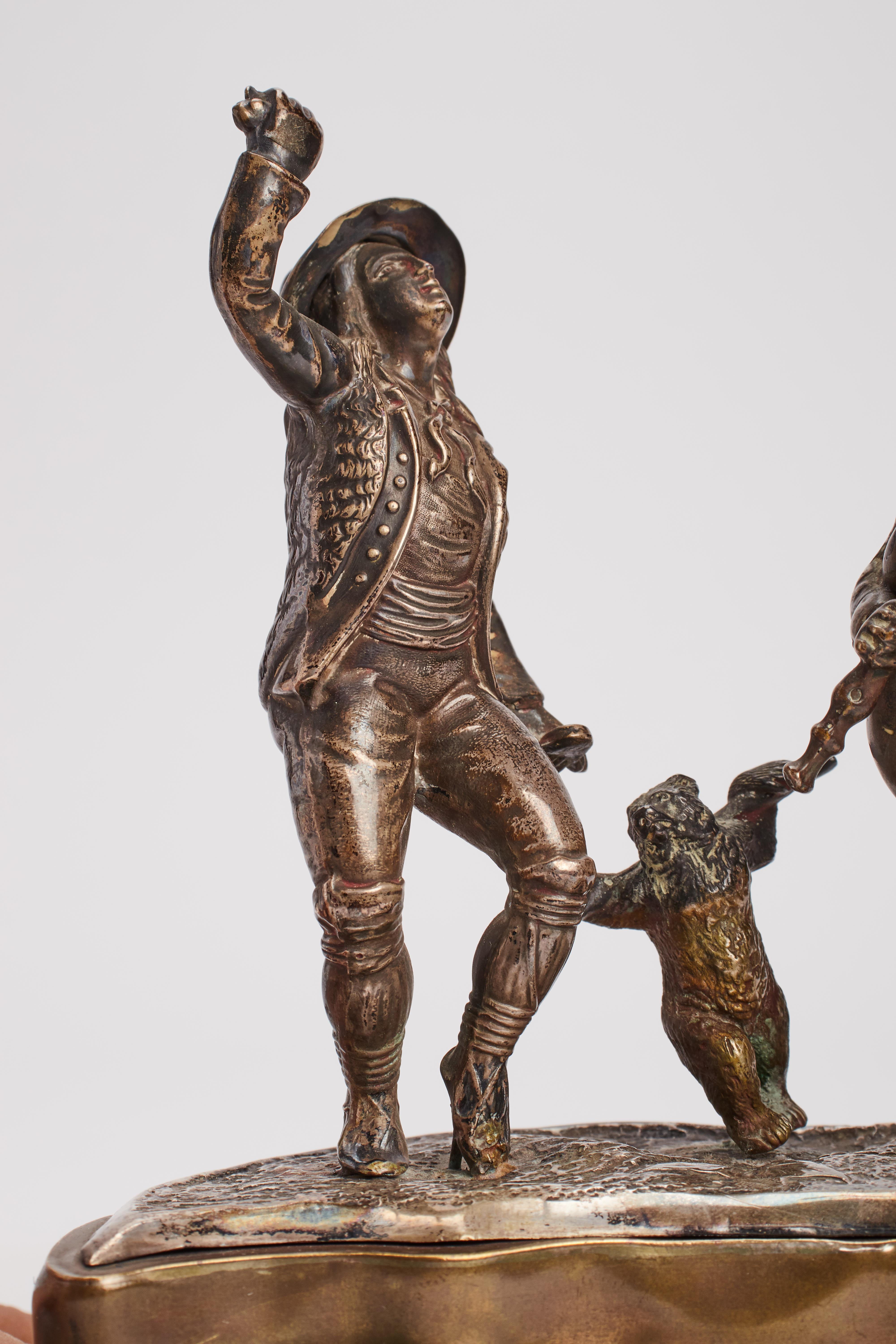 Silver Sculpture in silver and malachite, depicting a dancing bear, Russia 1880. For Sale