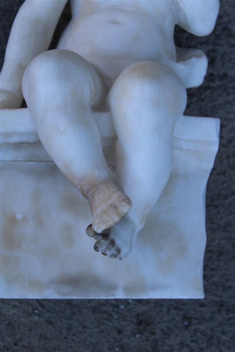 Sculpture in white alabaster 1910 with a child sitting on a wall thinking For Sale 1