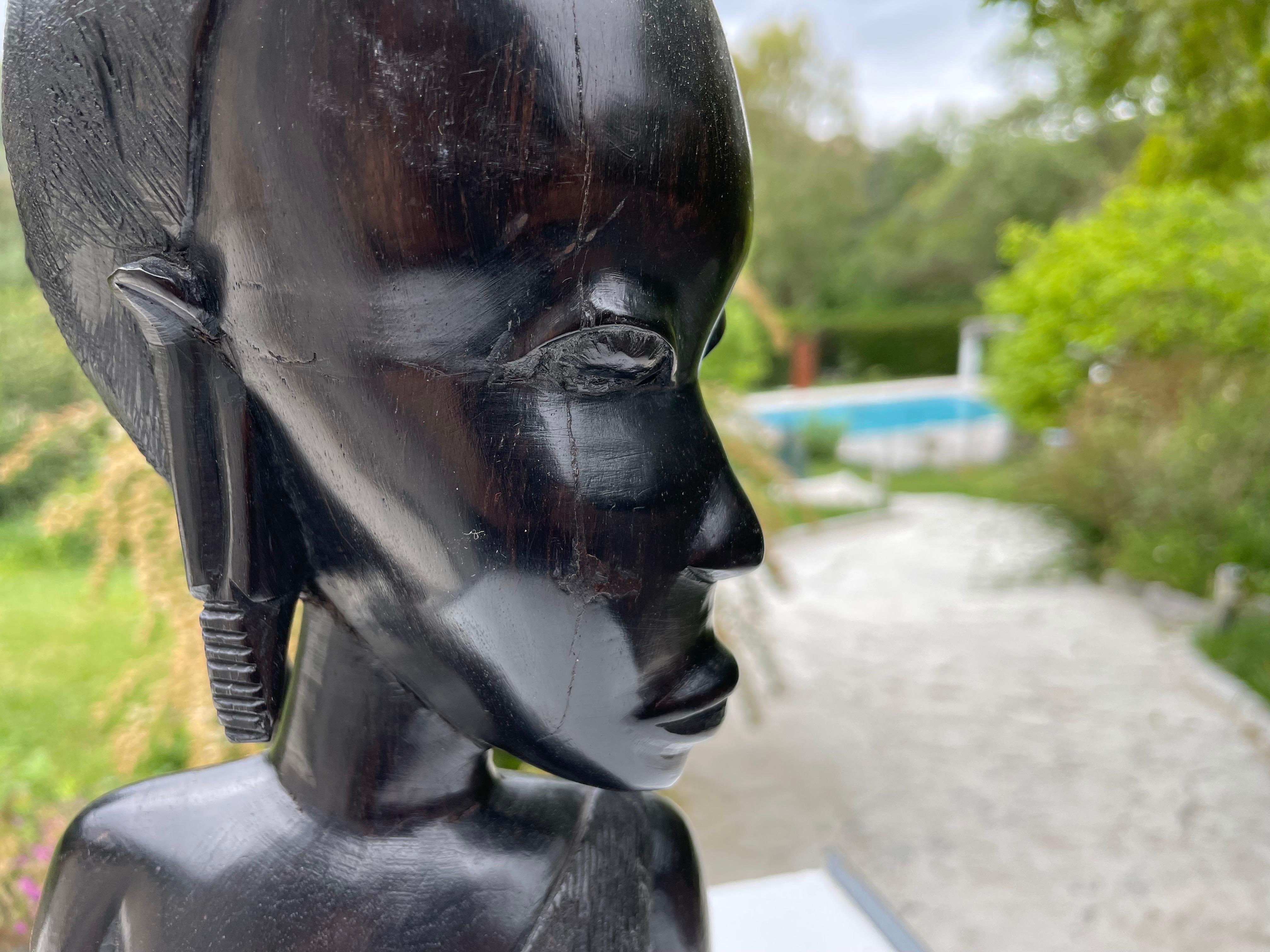 African Sculpture in Wood from Africa, Bust of a Woman, in a Black Color, circa 1960 For Sale