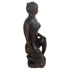 Sculpture en bois d'Afrique  Corps de femme, dans une couleur Brown 20TH Century