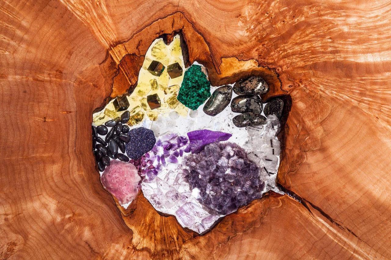 This wonderful sculpture in Honey Maple is embedded with stunning and rare crystal and gemstone inlays, making it a one of a kind handmade work. Inlays include uncommon specimens of the most gorgeous colors: Dioptase, Lepidolite, Pyrite, Amethyst,