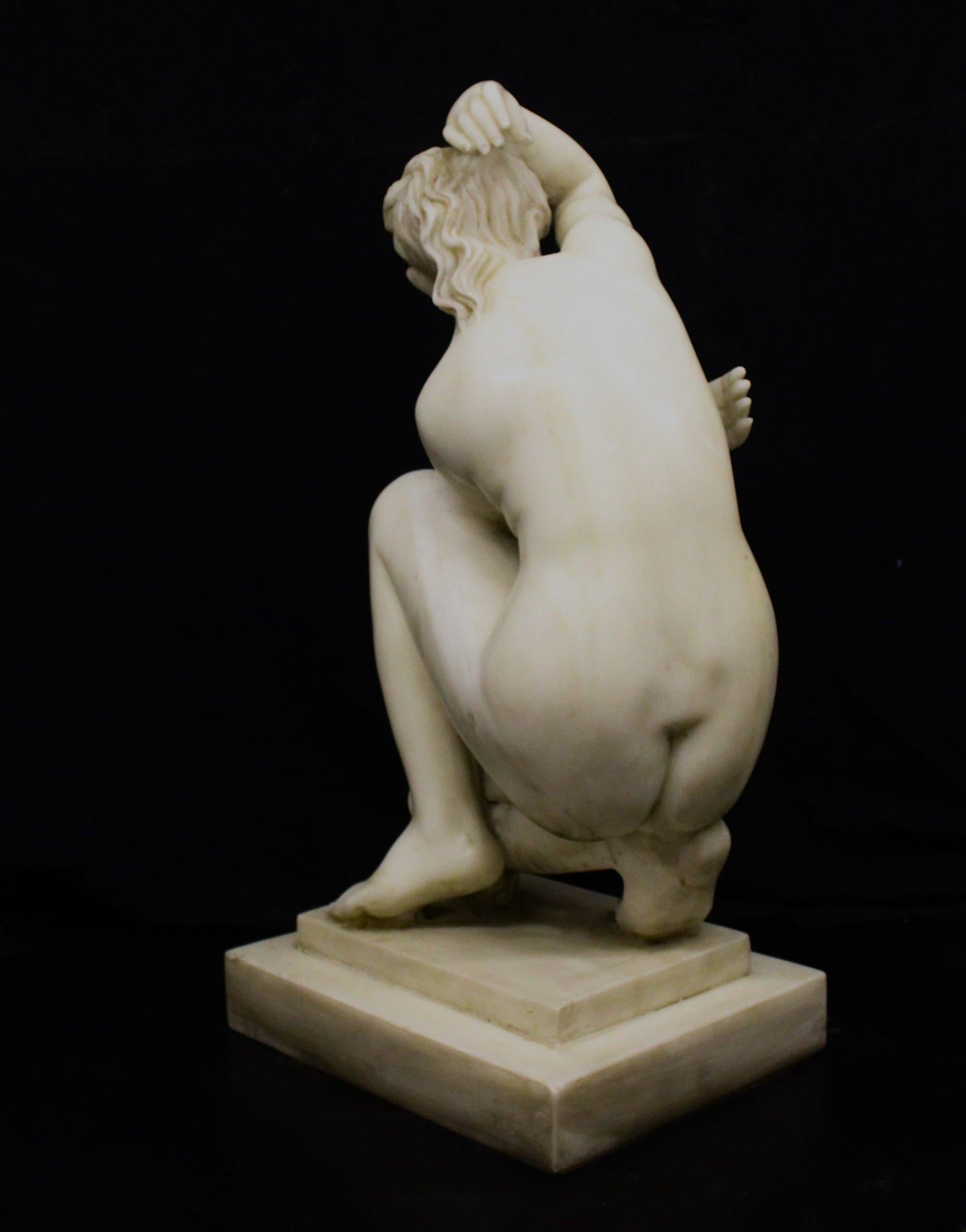 20th Century Sculpture, kneeling Venus in white marble For Sale