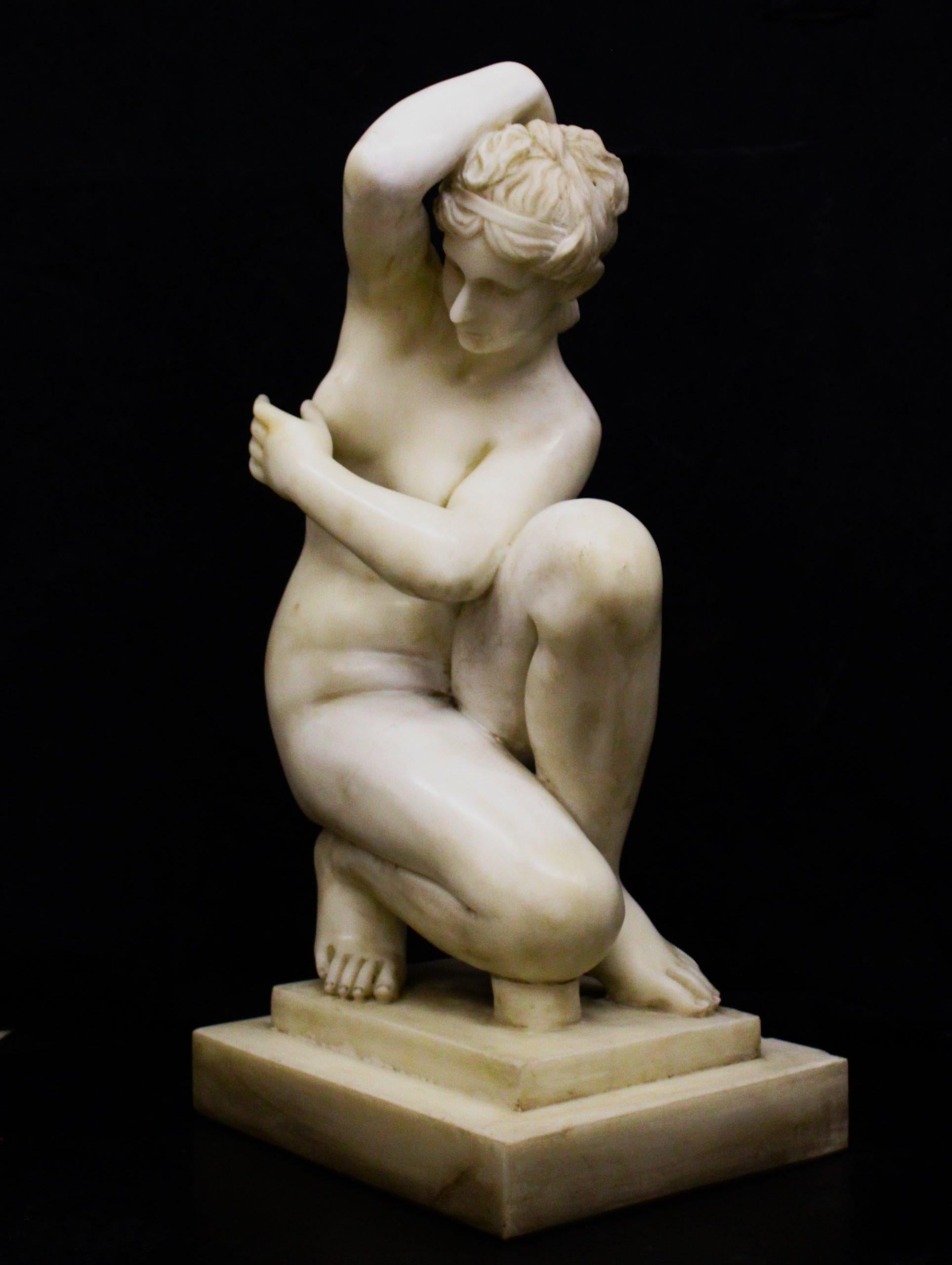 Marble Sculpture, kneeling Venus in white marble For Sale