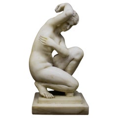 Vintage Sculpture, kneeling Venus in white marble