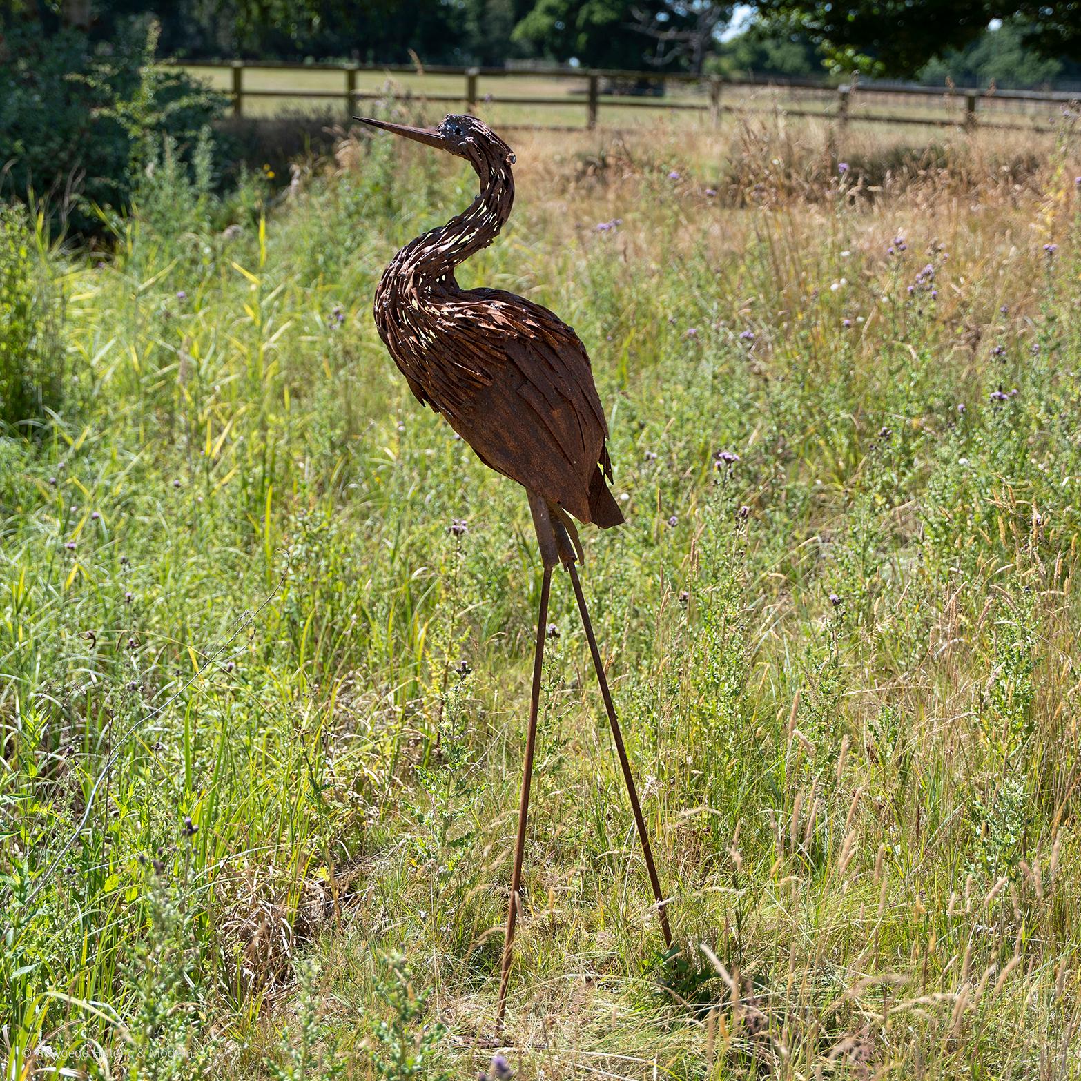 Realistic wrought iron life size, sculpture of a wading crane or large heron
Stylish feature in the garden, pond, river, lake or home

Measures: height 155cm., 61