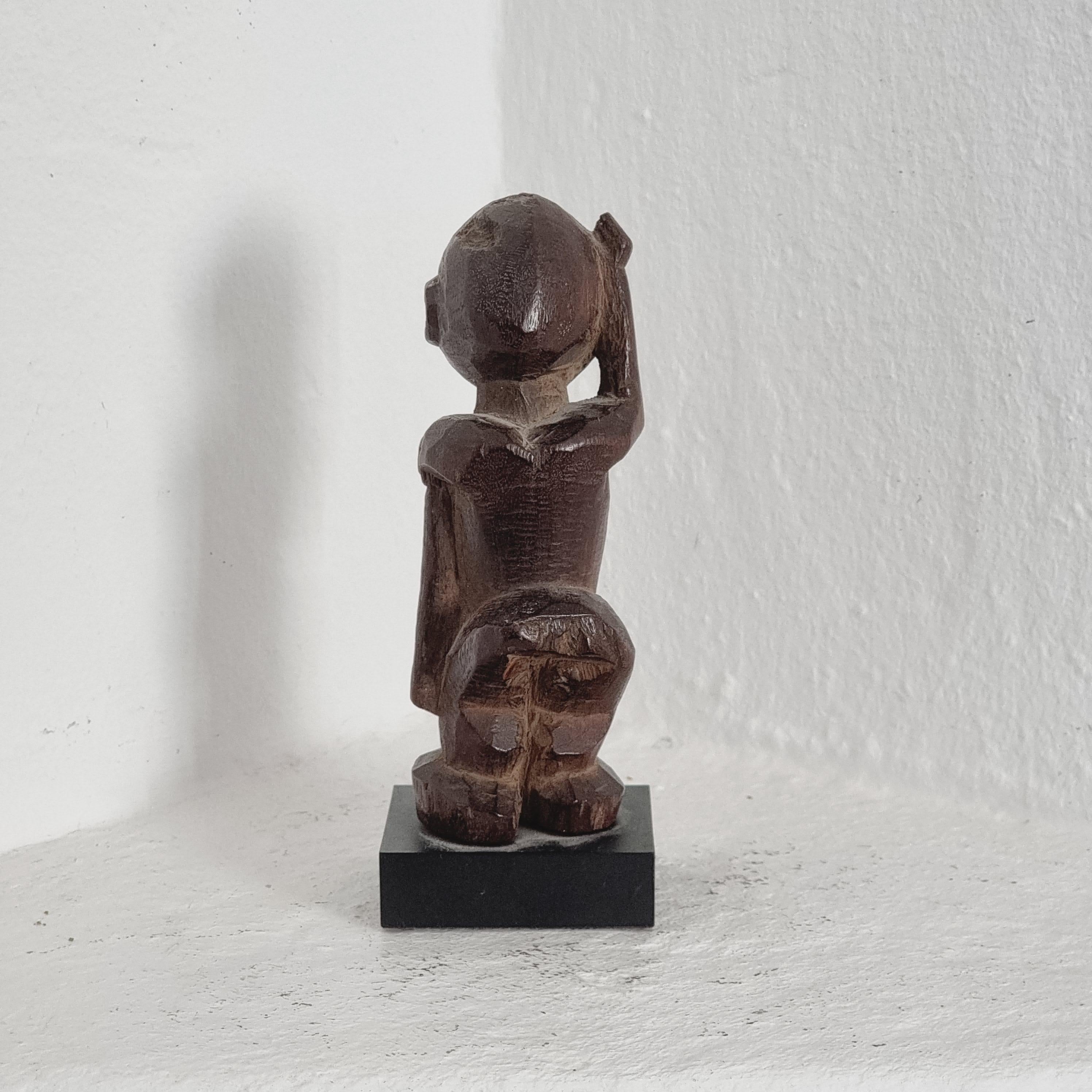 Hand-Carved Sculpture, Lobi Male Figure, Burkina Faso, Mid/Late-1900s For Sale