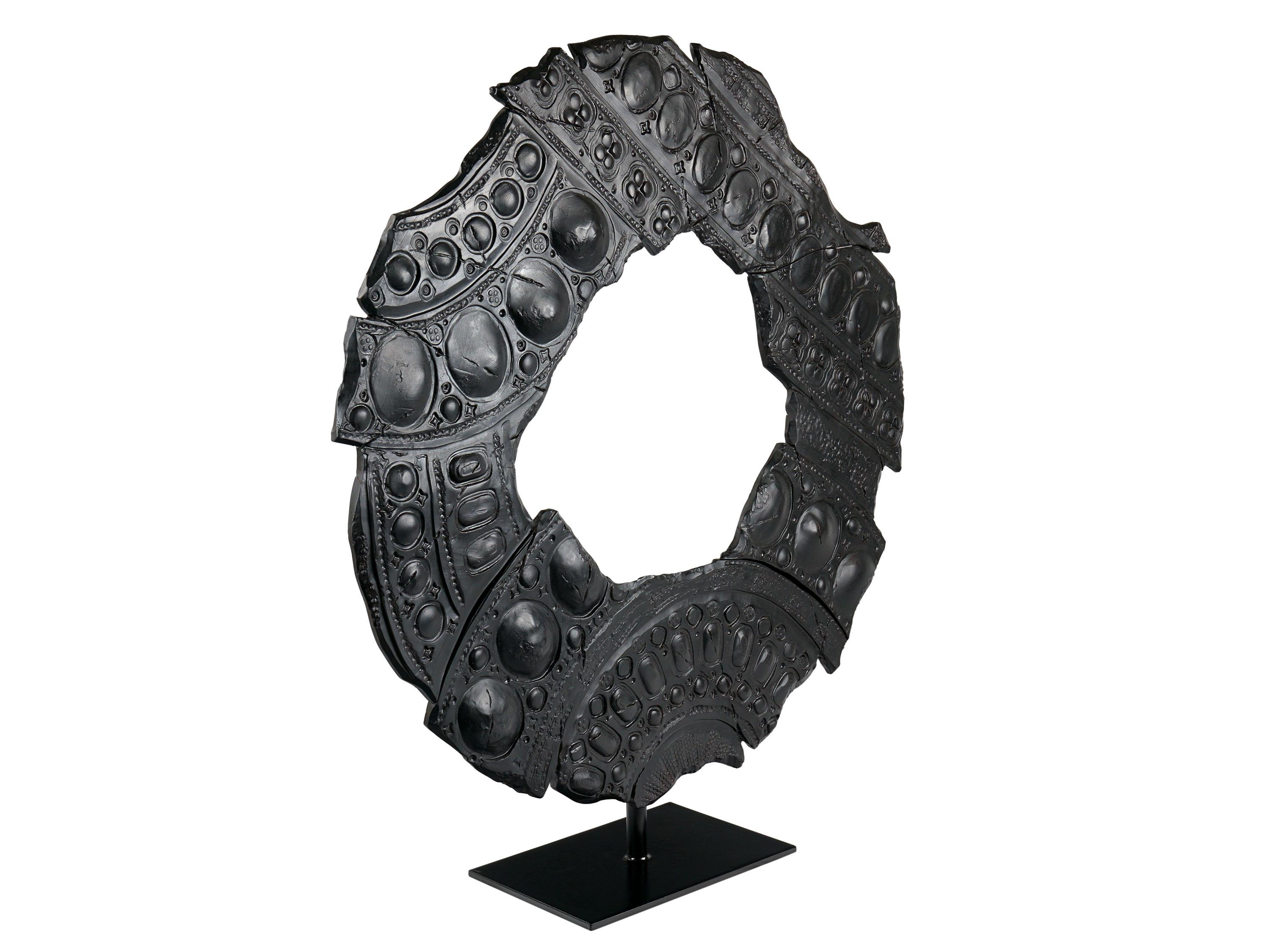 Matt black glazed ceramic sculpture, handmade in Italy by the artist G.Mengoni. The sculpture is mounted on a black painted wooden panel fixed to an adjustable black painted metal pedestal. Upon request, we can remove the easel and make the