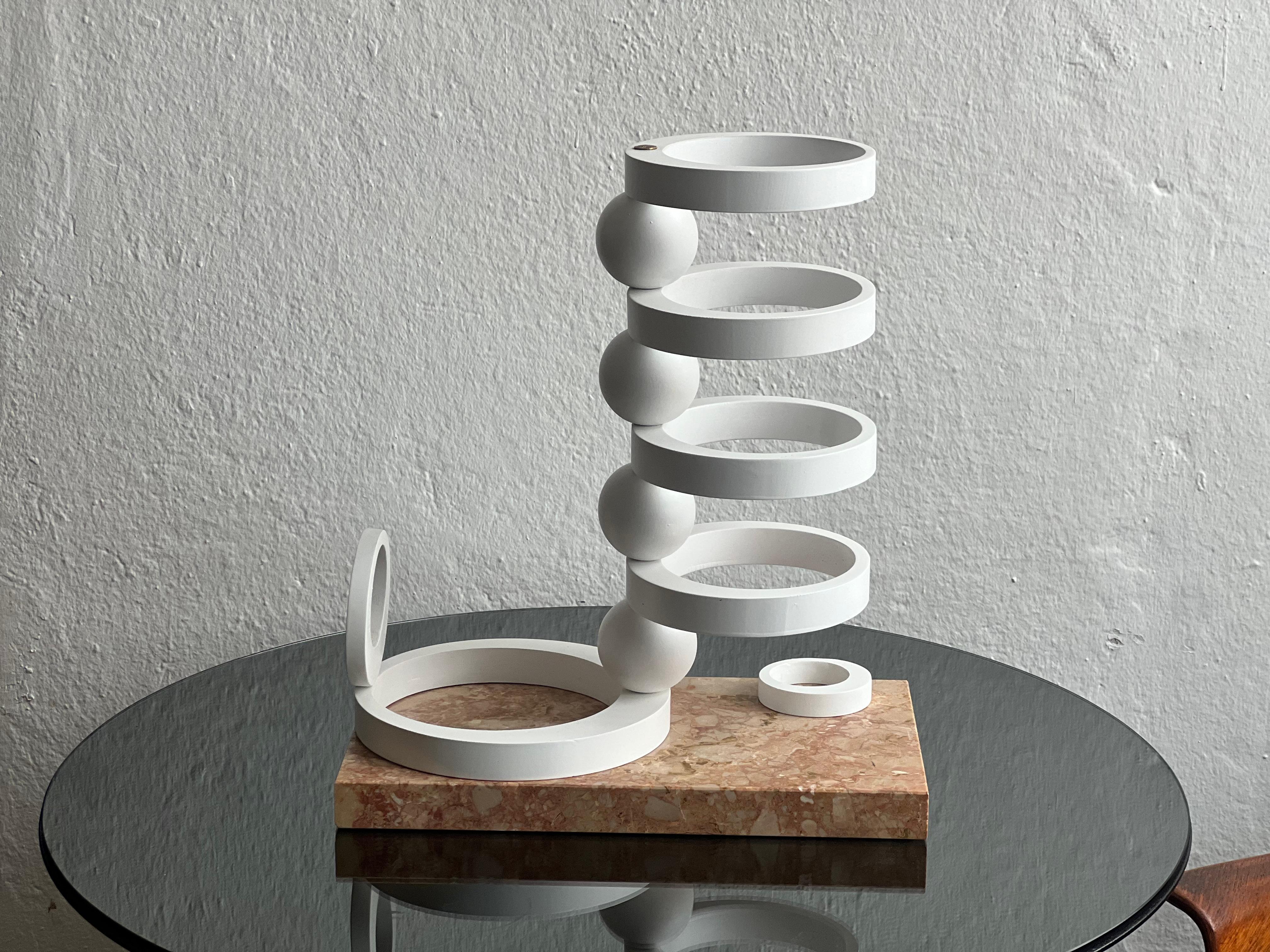 Sculpture model of the concrete Rationalist fountain In Como by Cattaneo e Radice 1935.

This is a perfect reproduction of the real sculpture in Como, painted wood built on top of a slab of solid red Italian marble 

What do you envisage when you