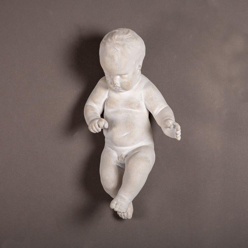 Sculpture of a Baby in Fine Plaster, XXIst Century.

Sculpture of a Baby in fine plaster, 21st century.
H: 55cm, W: 30cm, D: 21.5cm