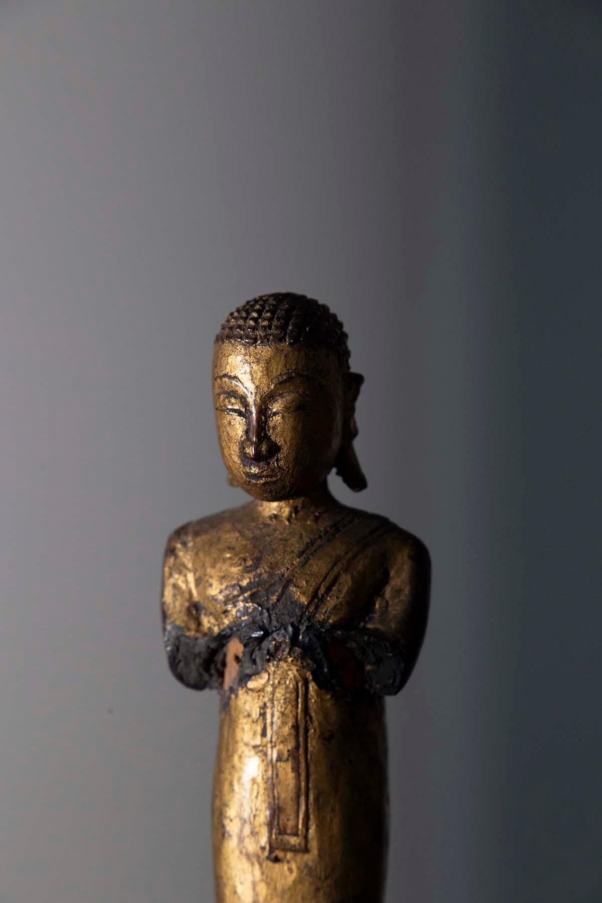 Burmese Sculpture of a Buddhist monk in praying wood Burma, 19th century For Sale
