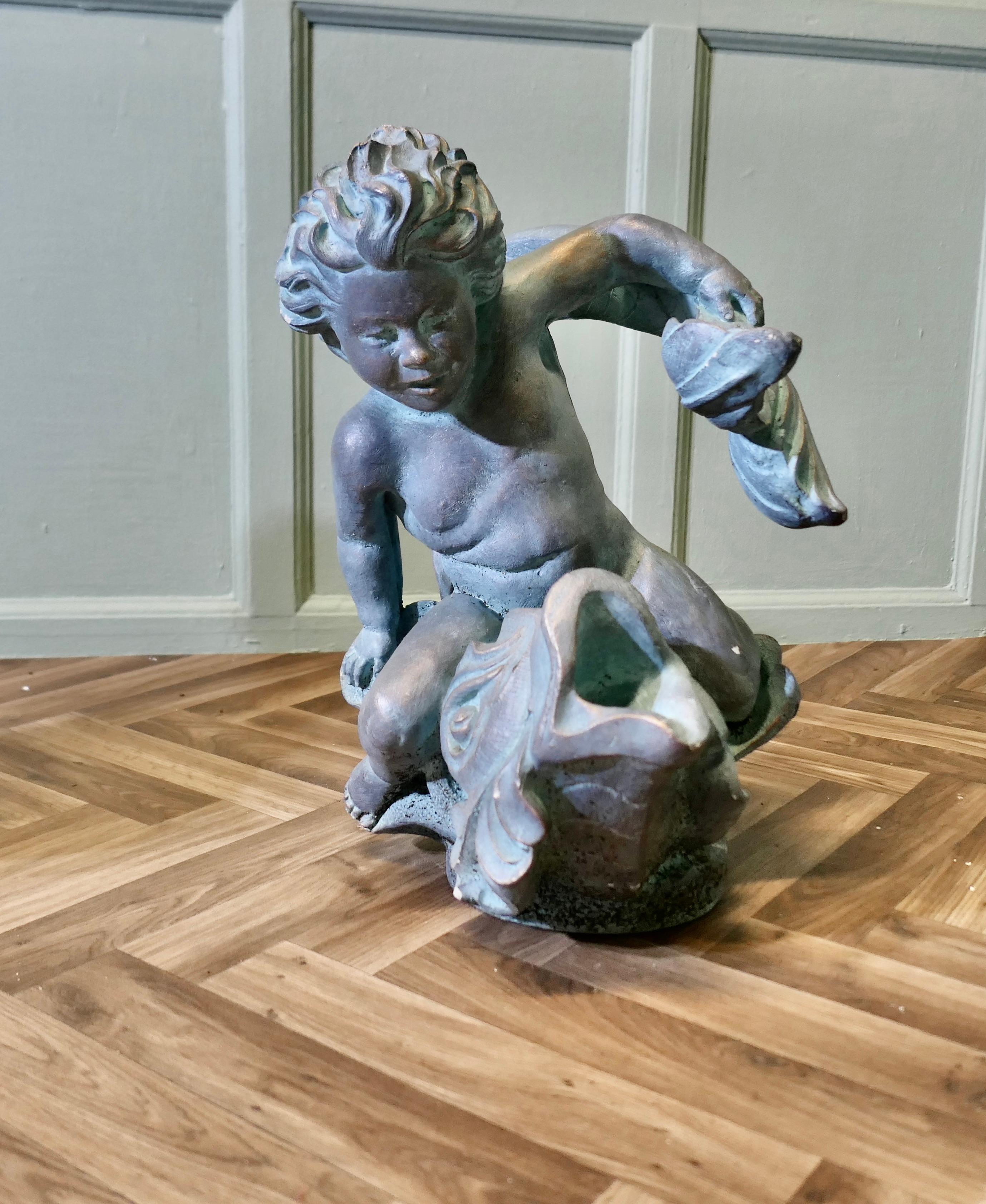 Sculpture of a Cherub Riding a Fish Fountain Water Feature
(2 of these are available)

A superb verdigris patinated Sculpture this one is designed as a fountain
Our cheeky little chap is riding a widemouthed fish, this is where the water falls