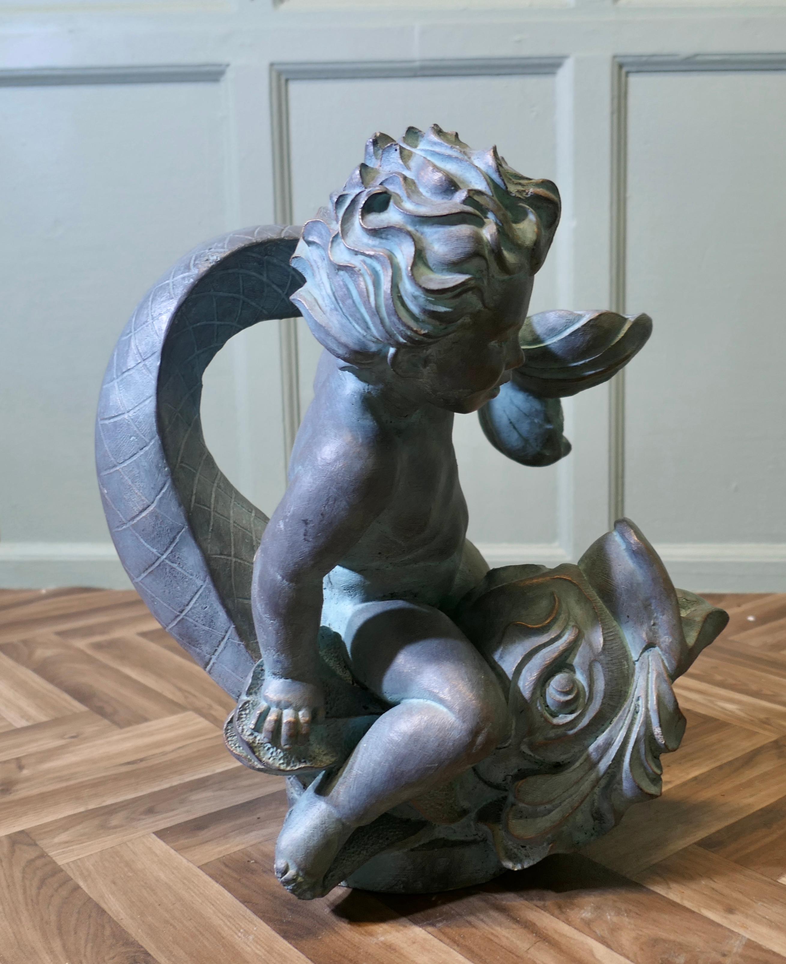 Composition Sculpture of a Cherub Riding a Fish Fountain Water Feature (2 Available) For Sale