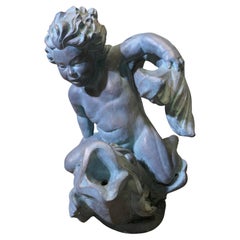 Sculpture of a Cherub Riding a Fish, Fountain Water Feature Sculpture of a Cherub Riding a Fish, Fountain Water Feature