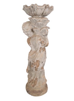 Sculpture of a Child with a French Terracotta Shell