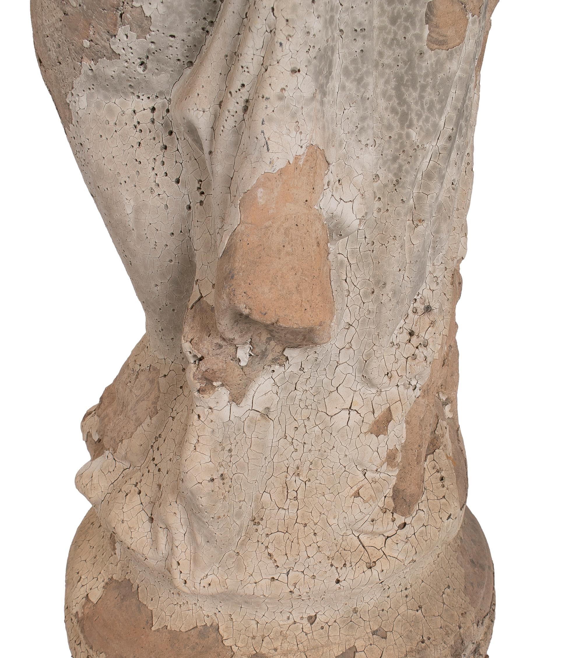 Sculpture of a Child with a French Terracotta Shell For Sale 5