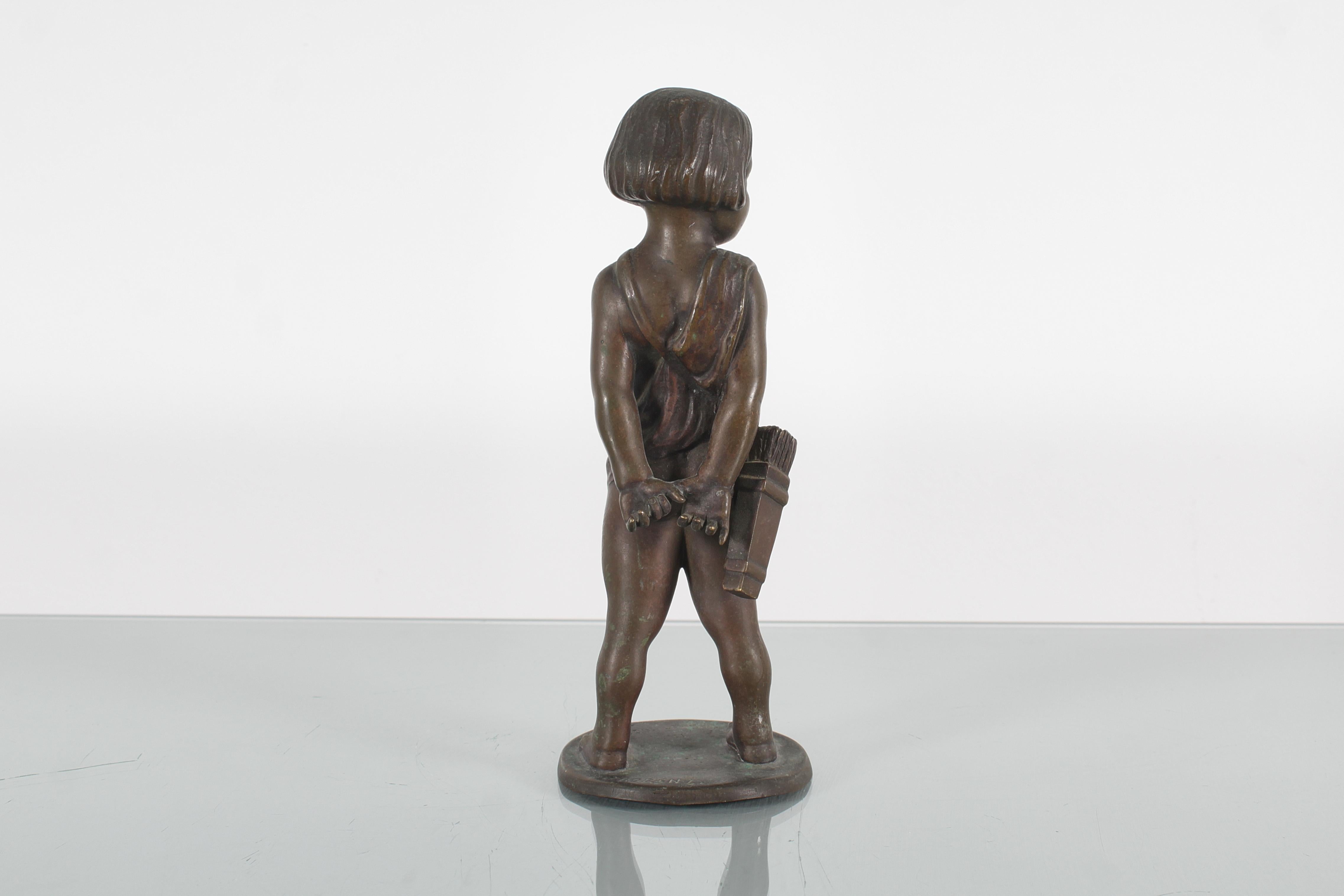 Early 20th Century Sculpture of a child with arrows in solid bronze signed. 1920s For Sale