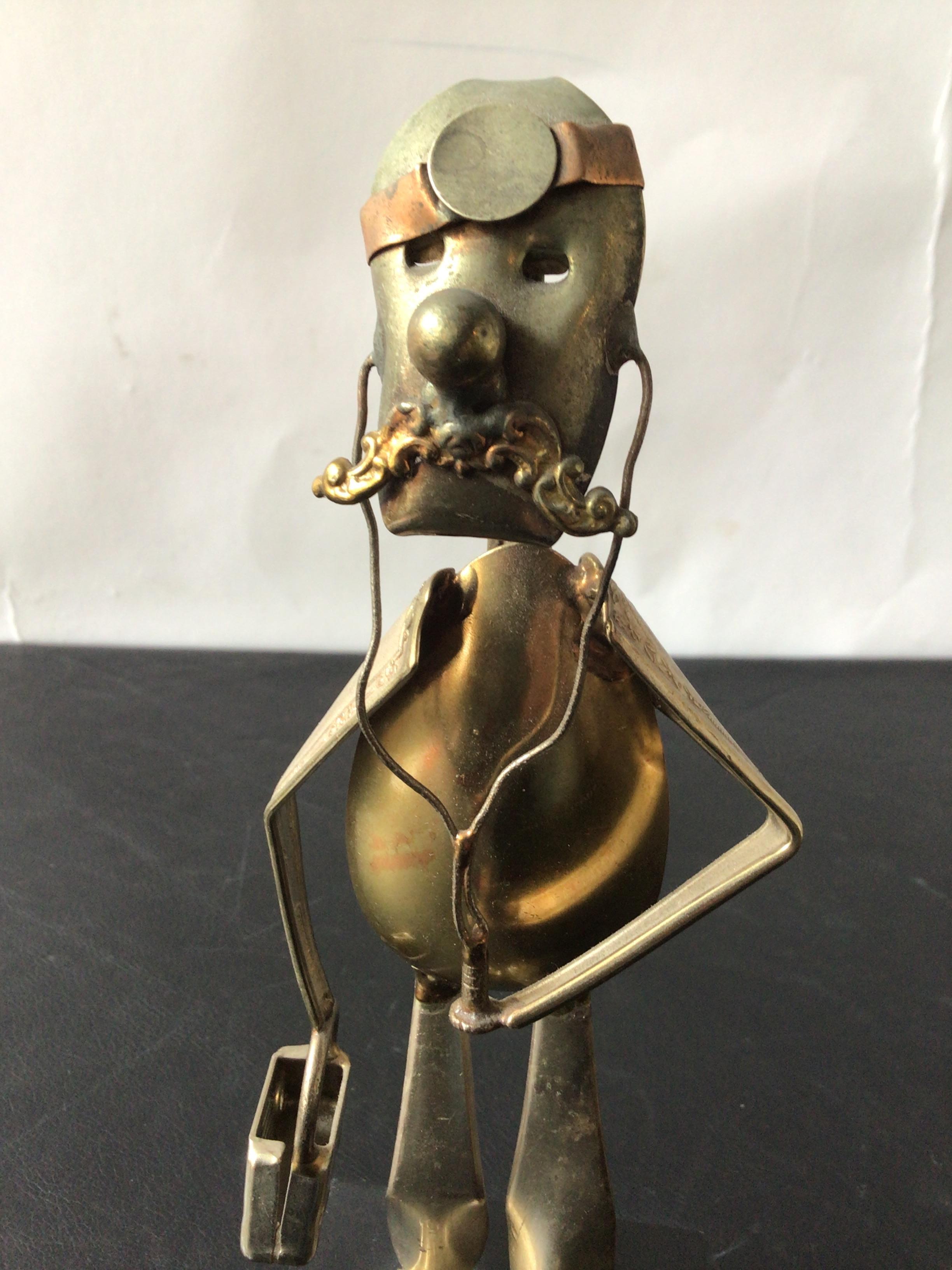 Sculpture of a Doctor Made from Spoons For Sale 1