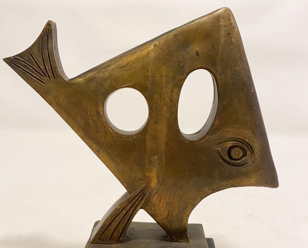 sculpture of a fish, signed

